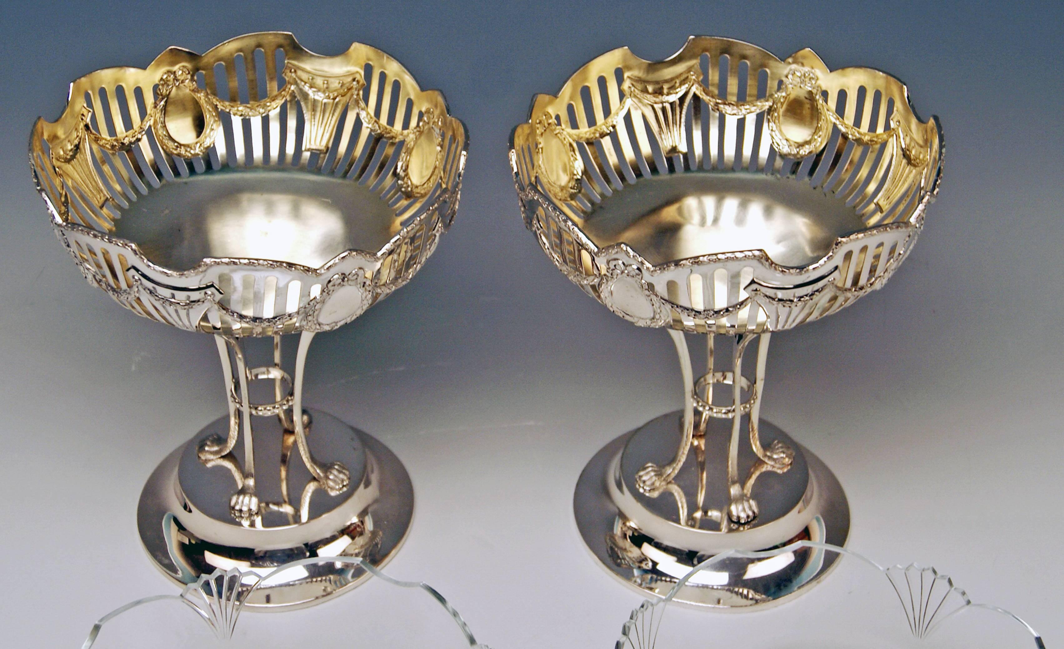Silver Austrian gorgeous pair of fruitbowls / centrepieces of most elegant appearance.

Manufactory:
Viennese silver manufactory FERDINAND VOGL (hallmarked).
Related manufactory was once situated in Viennese 7th district (at the address