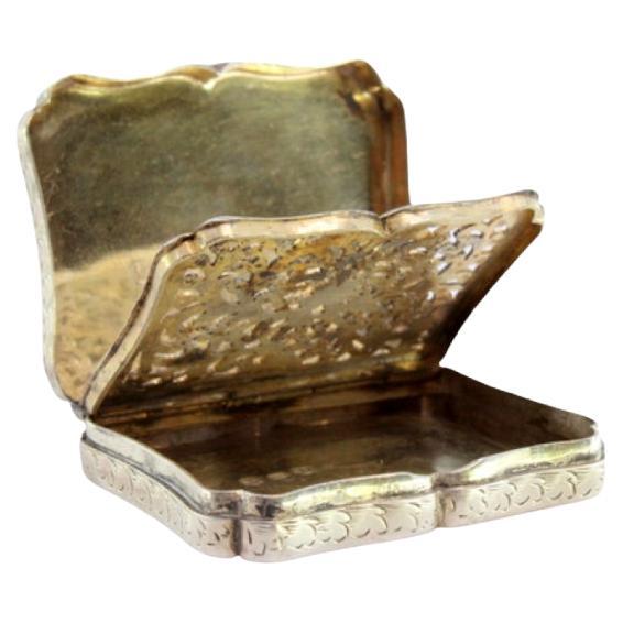 Silver vinaigrette box w/ floral reliefs & monogram on the lid w/ gold interior