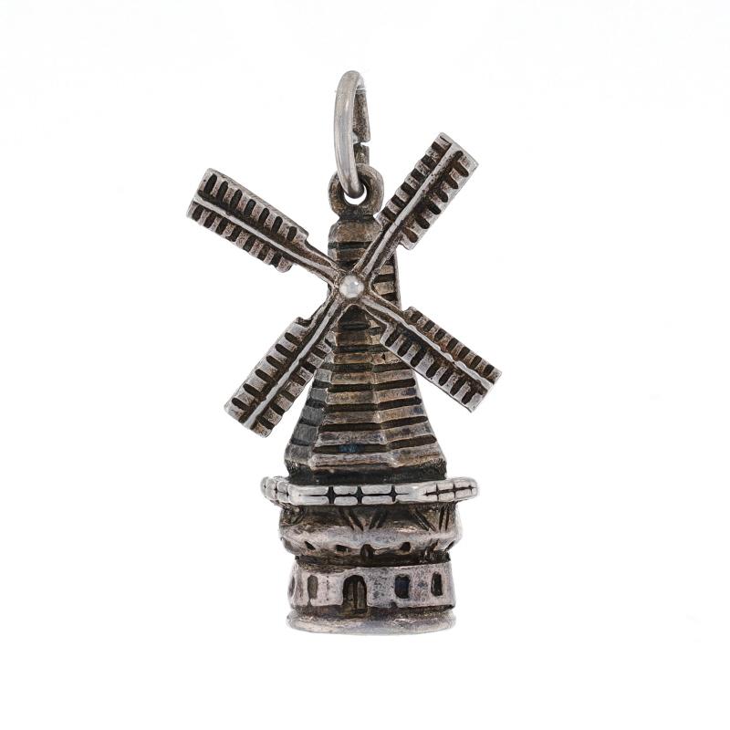 Era: Vintage

Metal Content: 800 Silver

Theme: Windmill, Travel Souvenir
Features: Sails Move

Measurements

Tall: 1 3/16