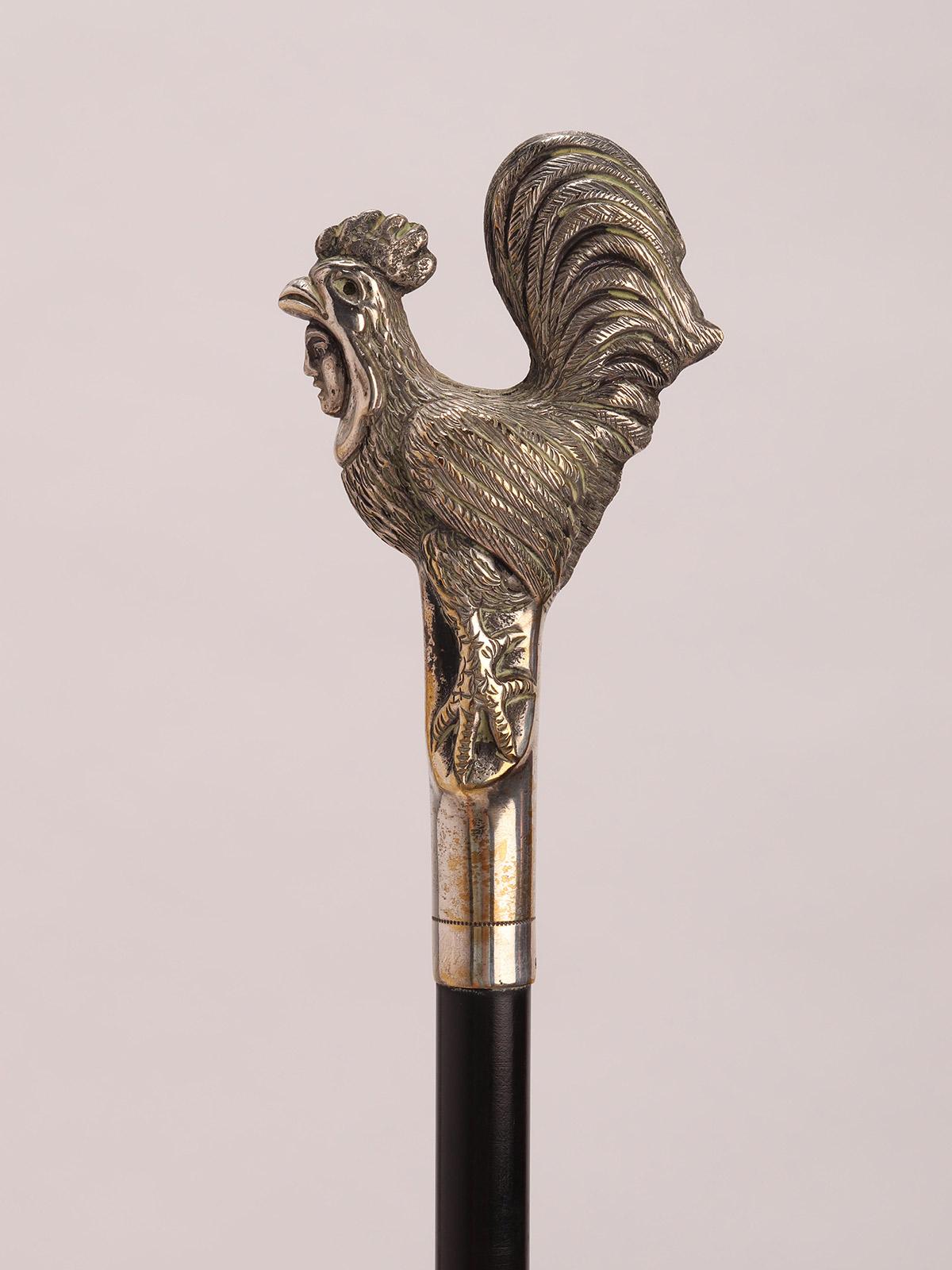 Bastone da passeggio in argento con un gallo con il volto di un uomo, Francia 1890. in vendita 1