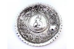 Silver wall tray with seated female figure & profuse relief