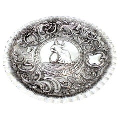 Silver wall tray with seated female figure 
profuse relief