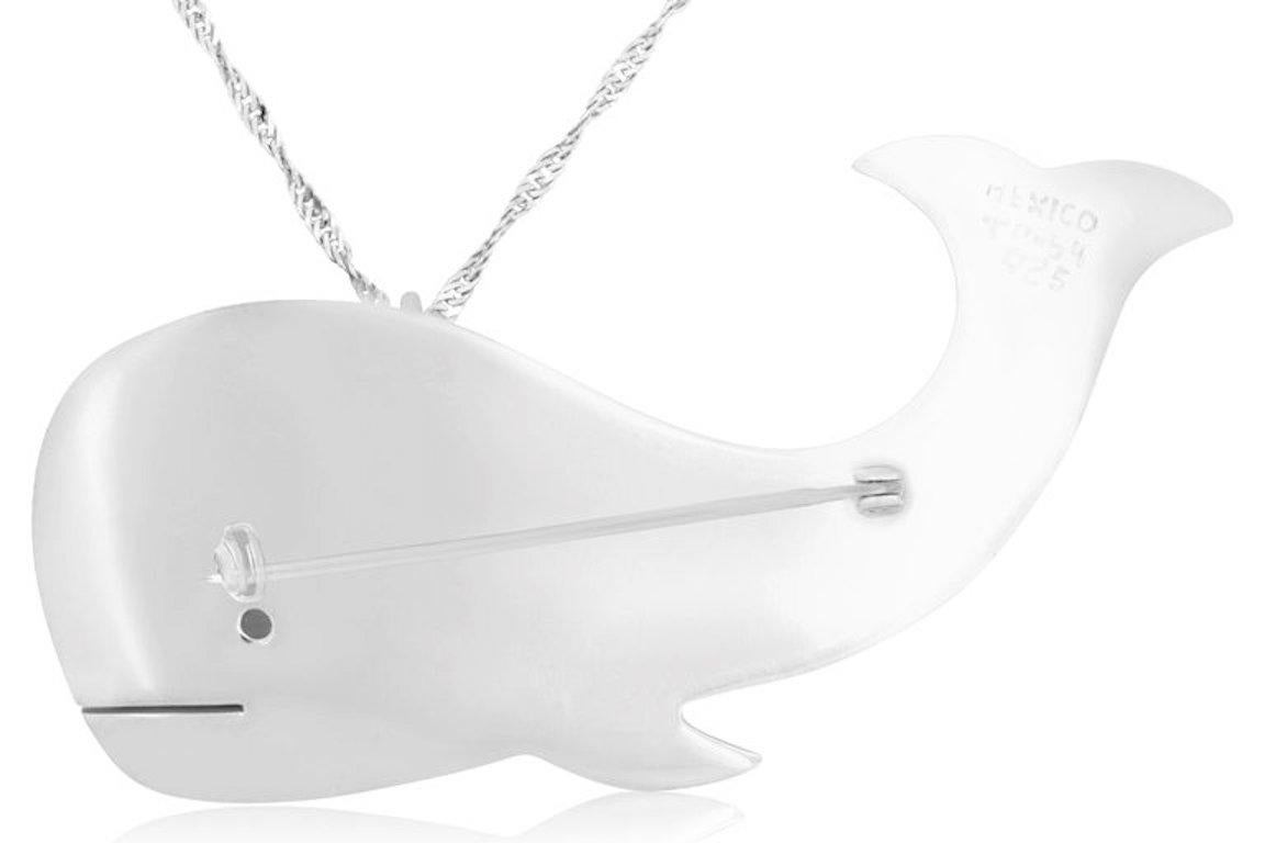 An adorable and fun piece, this Silver Whale can be worn as a pendant or a pin!

Material: Silver

Fine one-of-a-kind craftsmanship meets incredible quality in this breathtaking piece of jewelry.