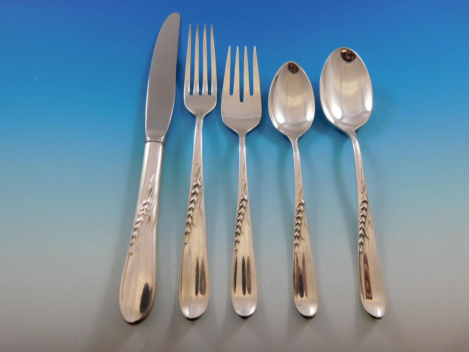 Superb silver wheat by Reed & Barton sterling silver flatware set, 66 pieces. This set includes:

12 knives, 8 3/4