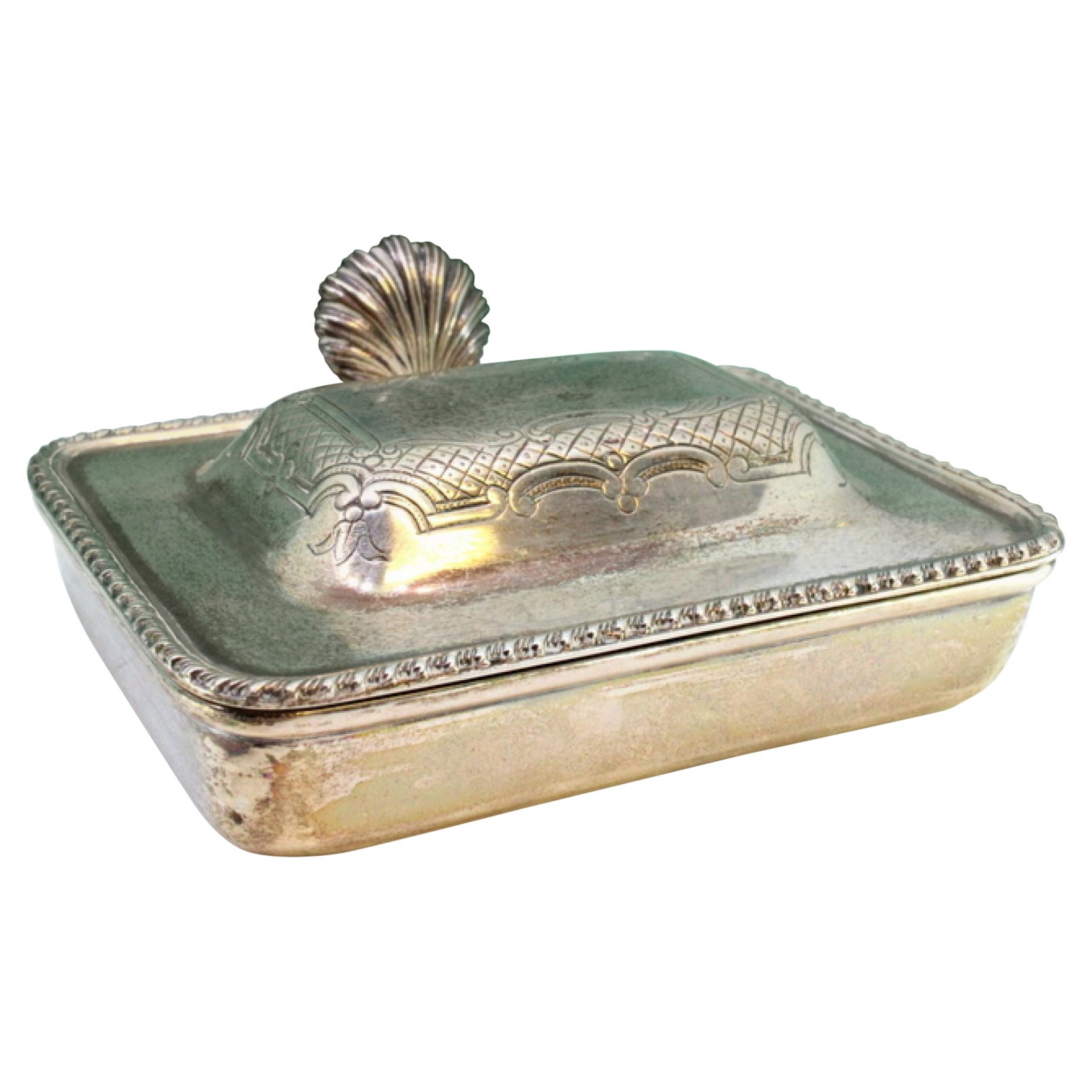 Silver whisk w/ surrounding reliefs, plant engravings
a chestnut wood handle