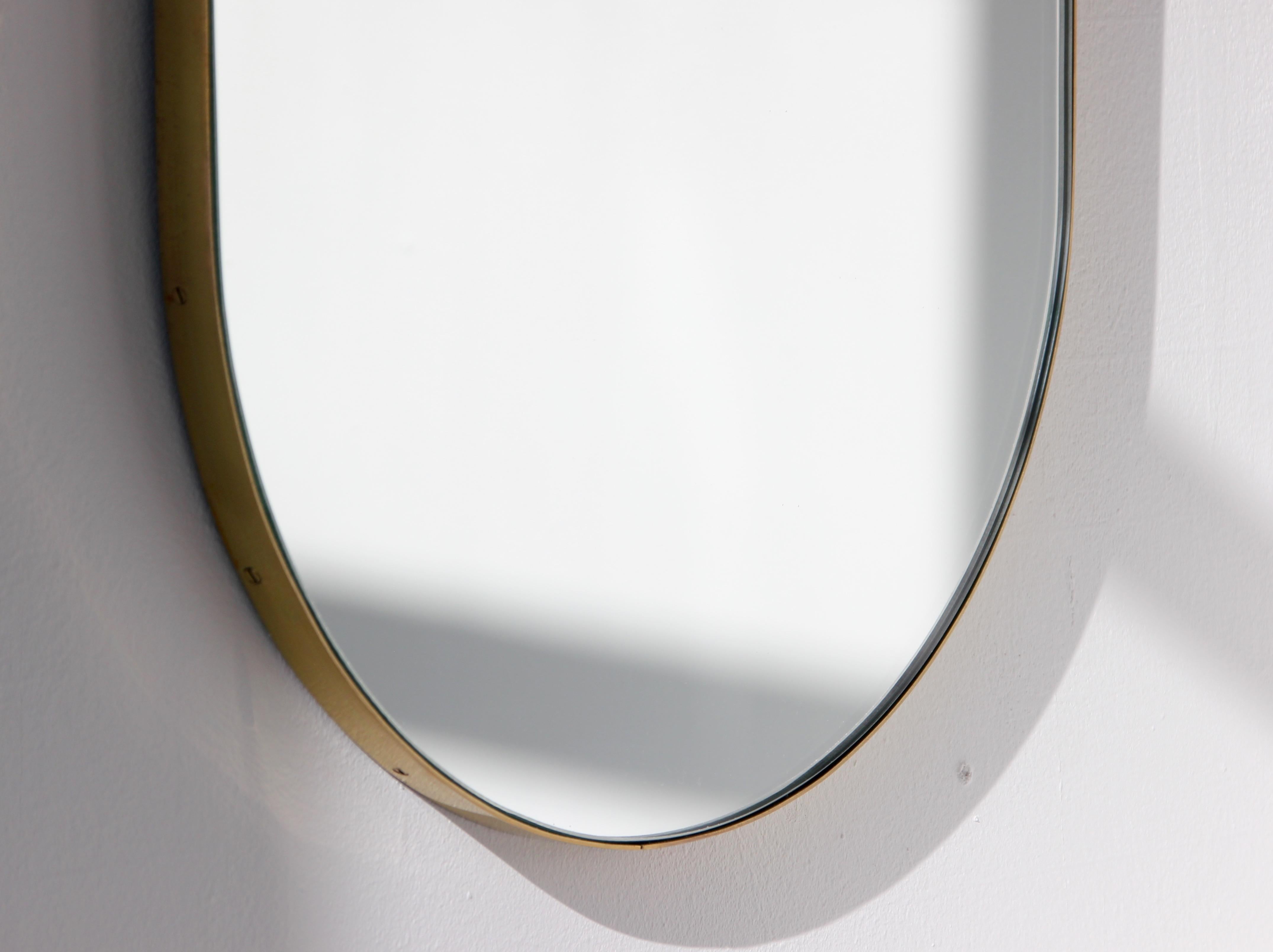 brass pill shaped mirror