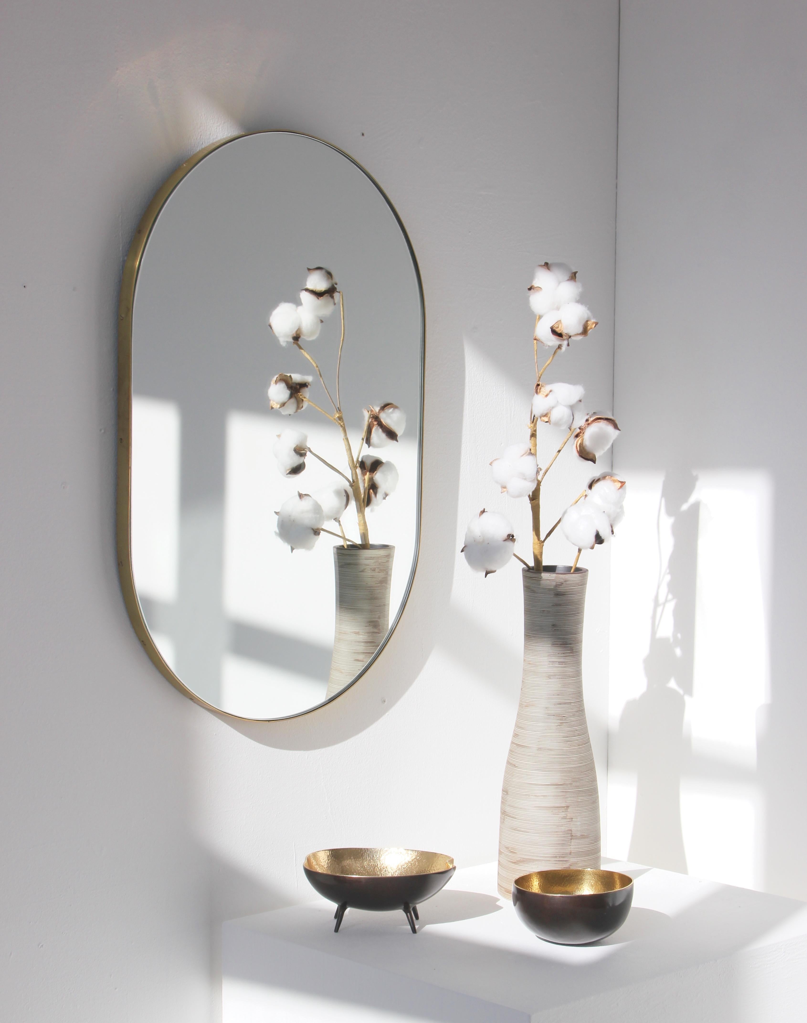 British Silver Wide Capsule Mirror with a Brass Frame