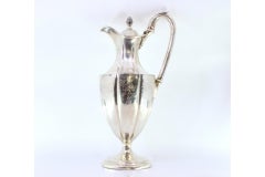 Silver wine jug w/ engraved wine motifs, knob on the hinged lid & circular base