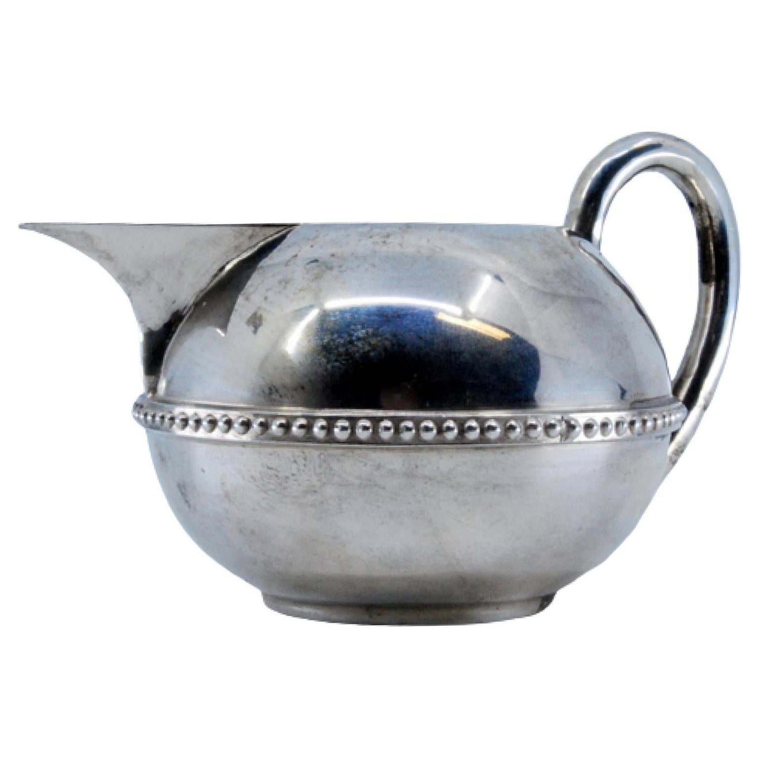 Silver wine jug with raised surround on the frieze