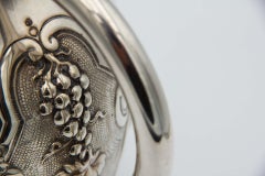 Silver wine jug with reliefs