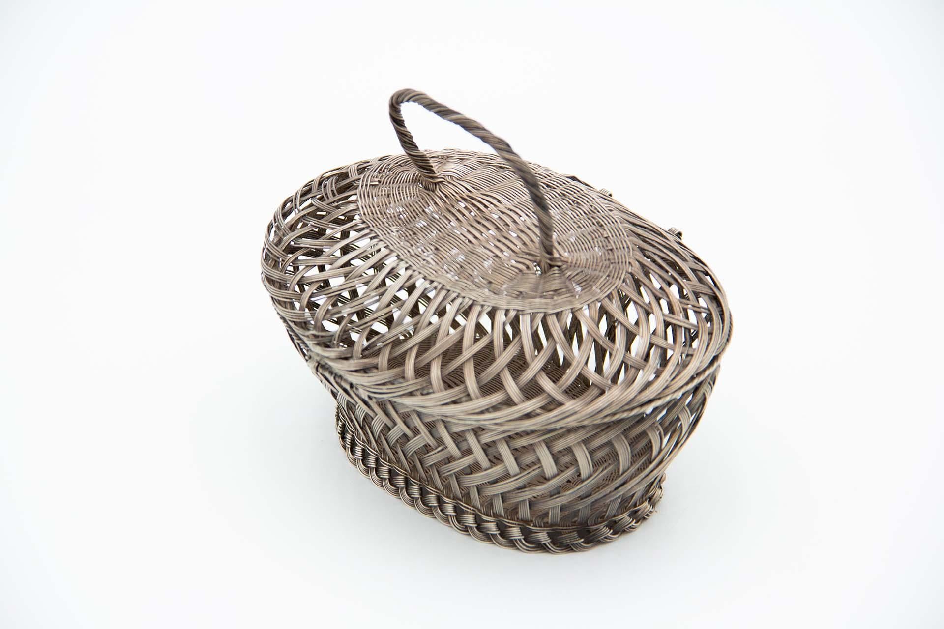European Silver wire basket with tilting handle For Sale