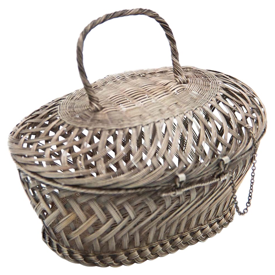 Silver wire basket with tilting handle