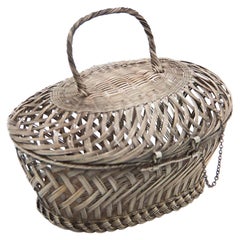 Silver wire basket with tilting handle