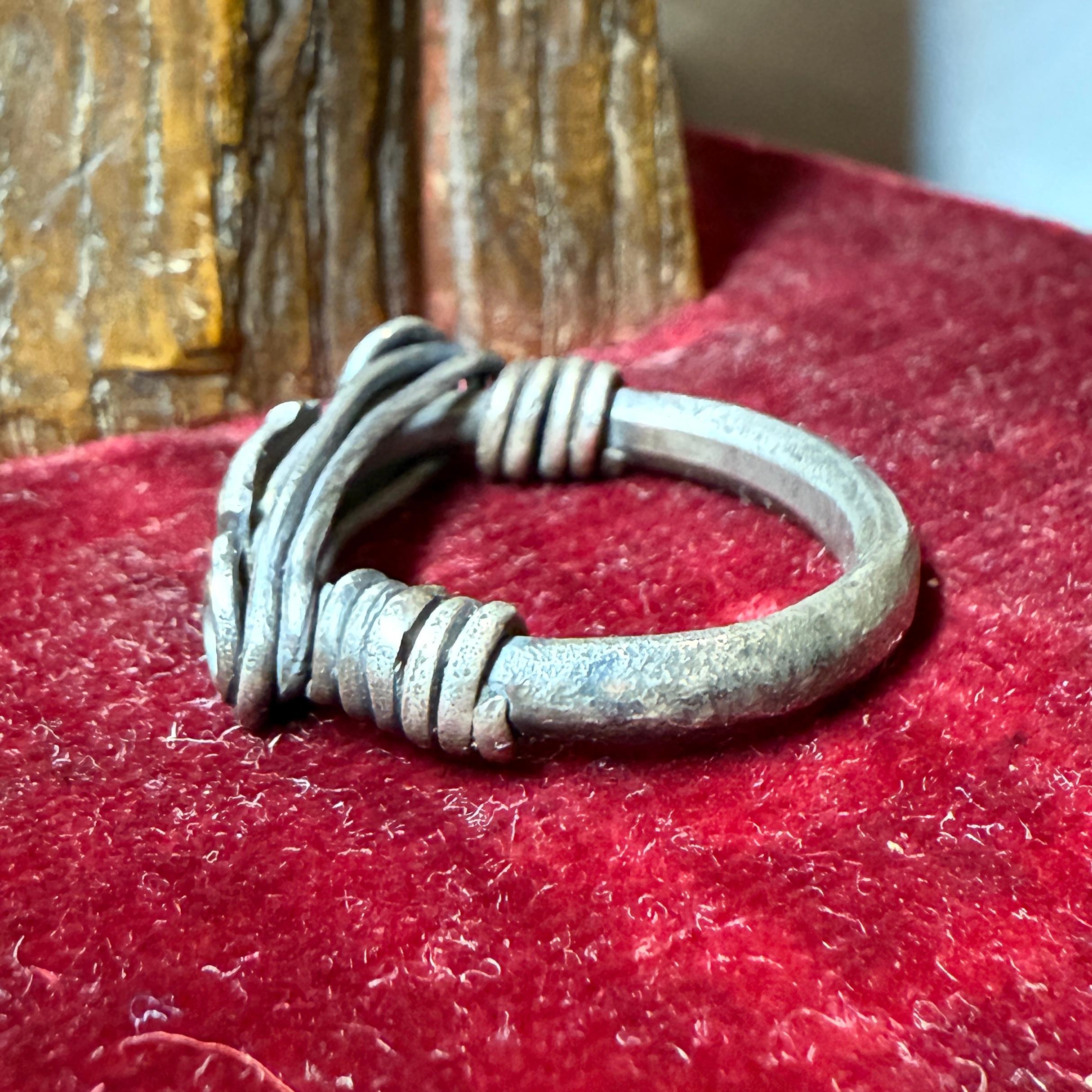 Silver Ring with Spiralled Terminals and Axe-Motif. Balkans, 1st–2nd century AD. For Sale 6