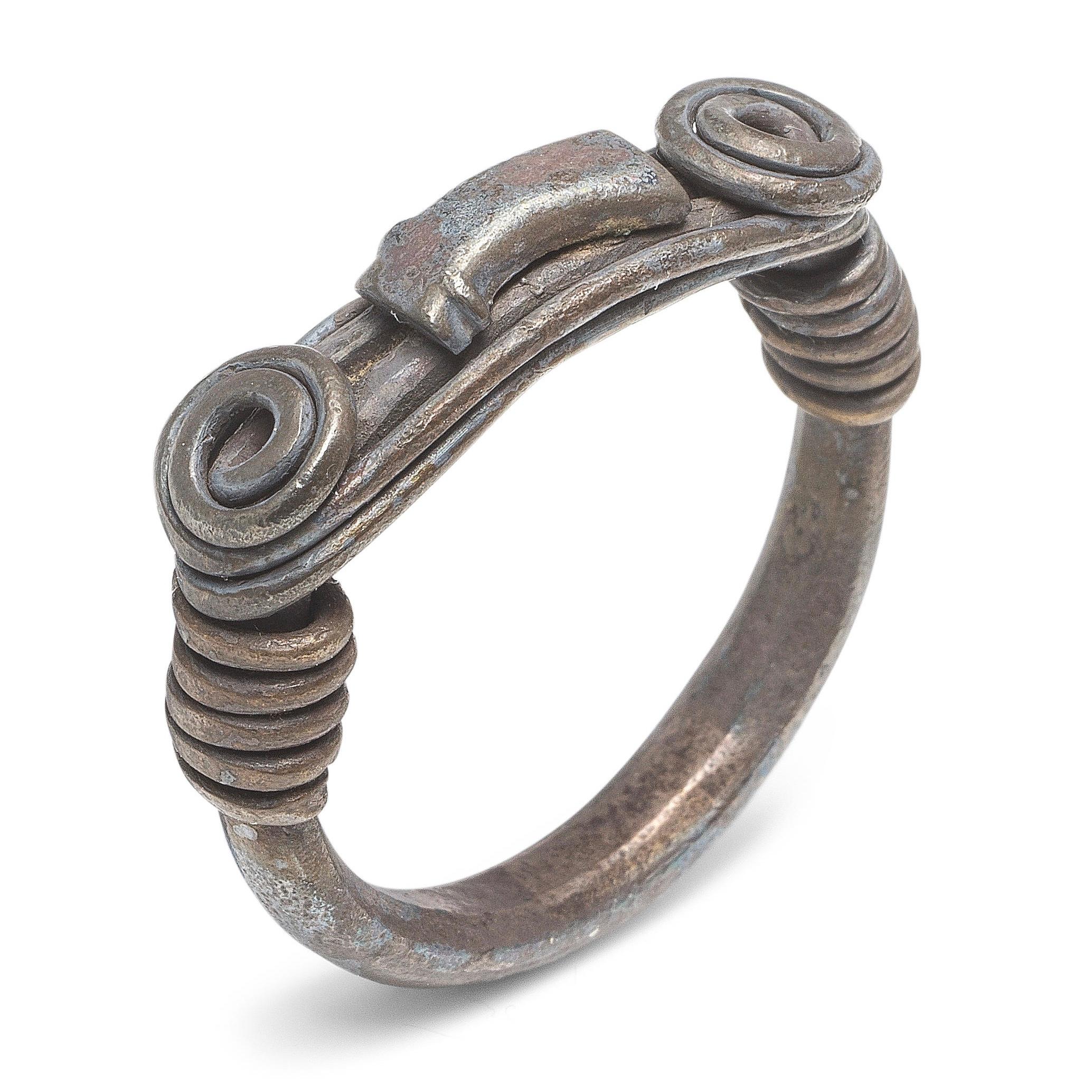 Silver Ring with Spiralled Terminals and Axe-Motif. Balkans, 1st–2nd century AD. For Sale 8