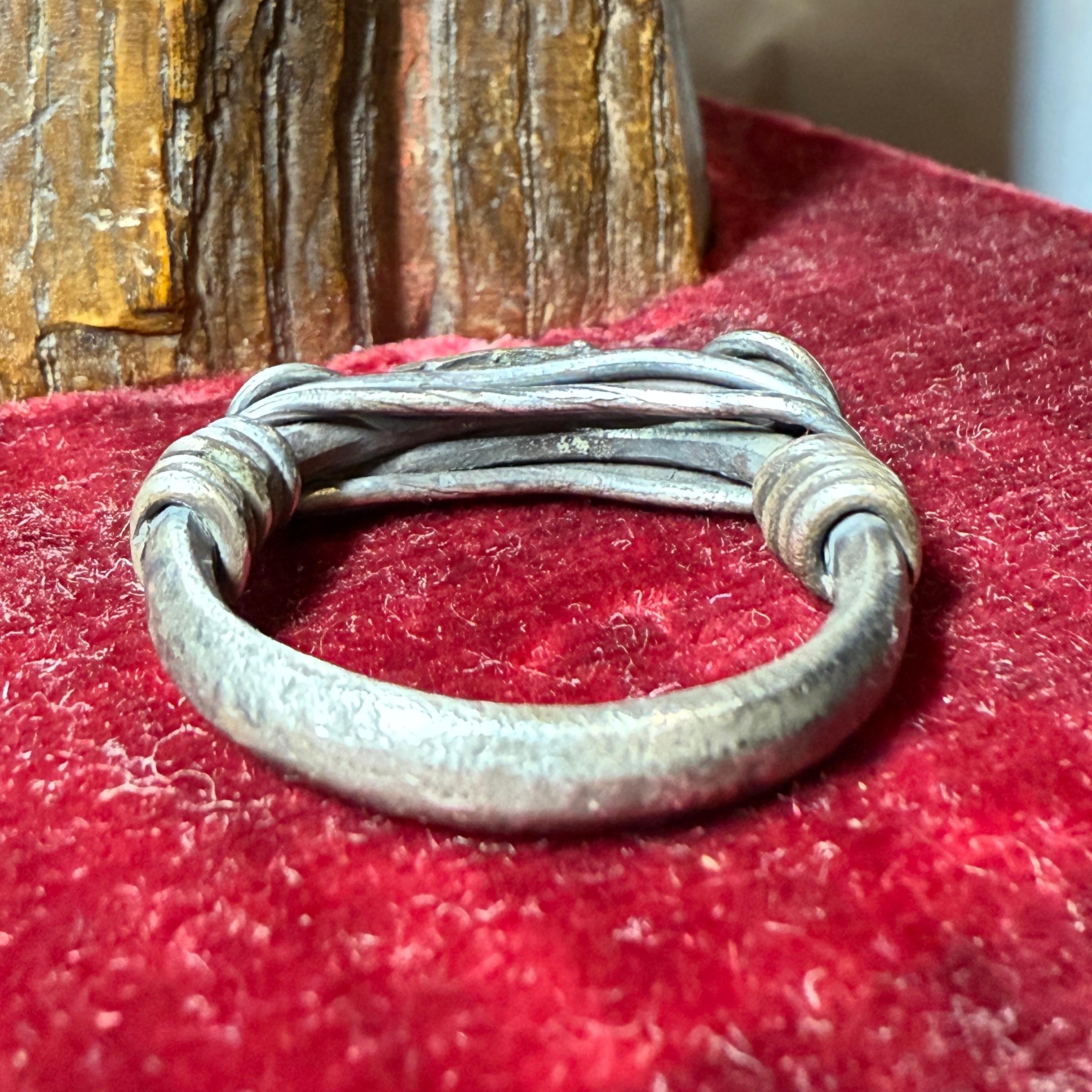 Silver Ring with Spiralled Terminals and Axe-Motif. Balkans, 1st–2nd century AD. For Sale 10