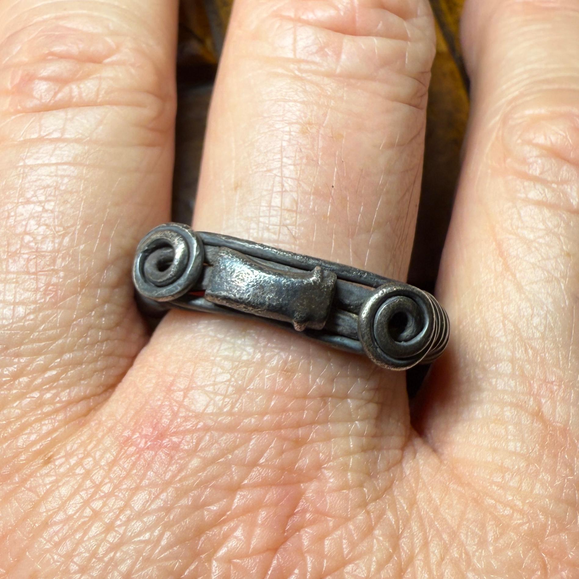Women's or Men's Silver Ring with Spiralled Terminals and Axe-Motif. Balkans, 1st–2nd century AD. For Sale