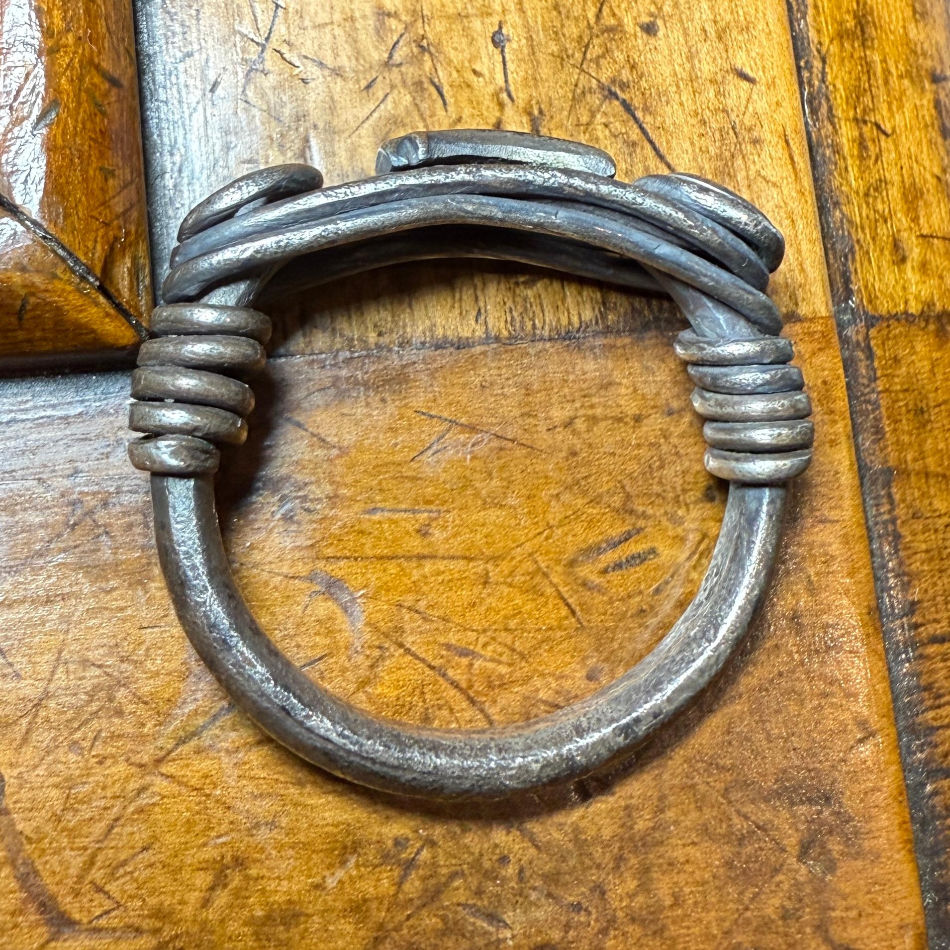 Silver Ring with Spiralled Terminals and Axe-Motif. Balkans, 1st–2nd century AD. For Sale 1