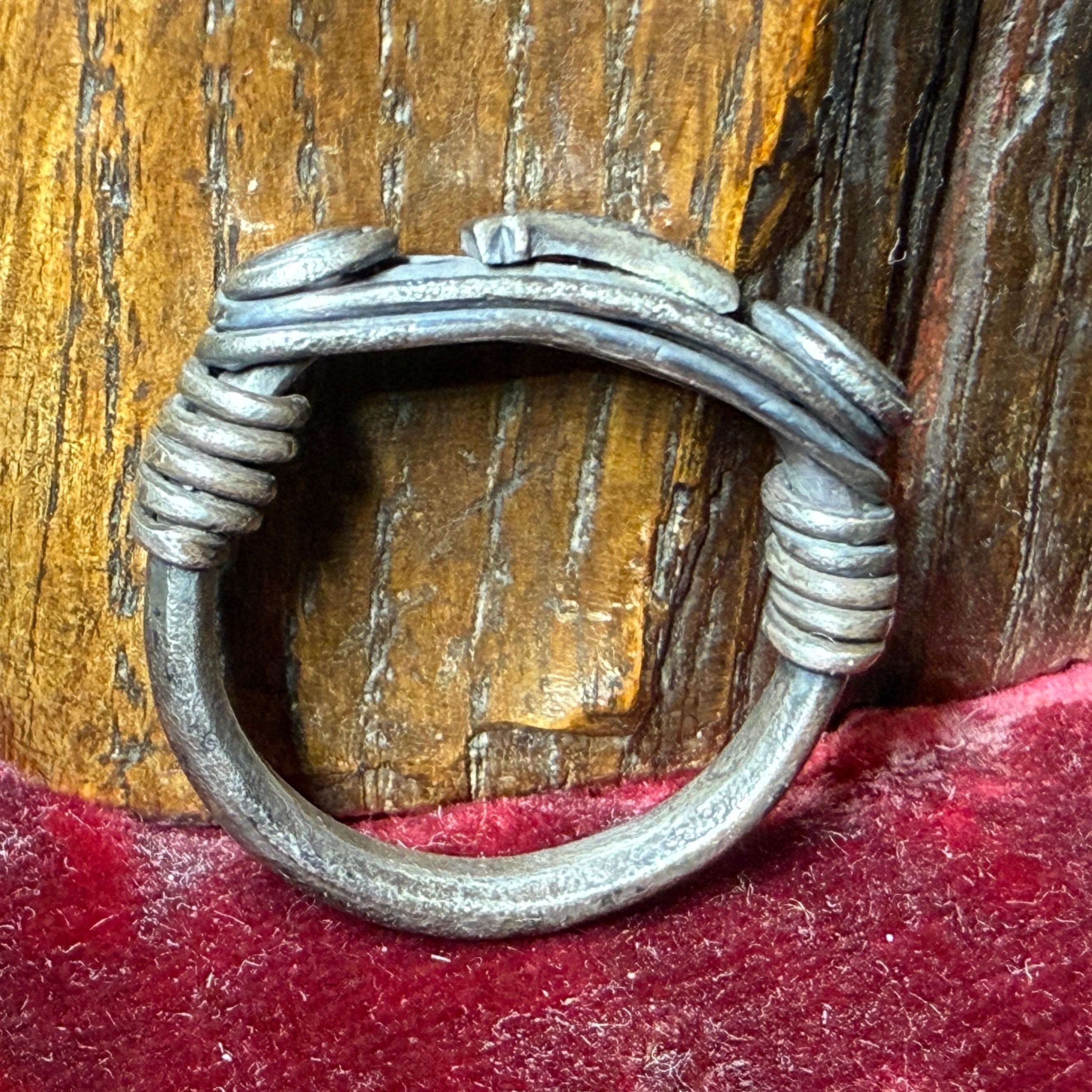 Silver Ring with Spiralled Terminals and Axe-Motif. Balkans, 1st–2nd century AD. For Sale 4
