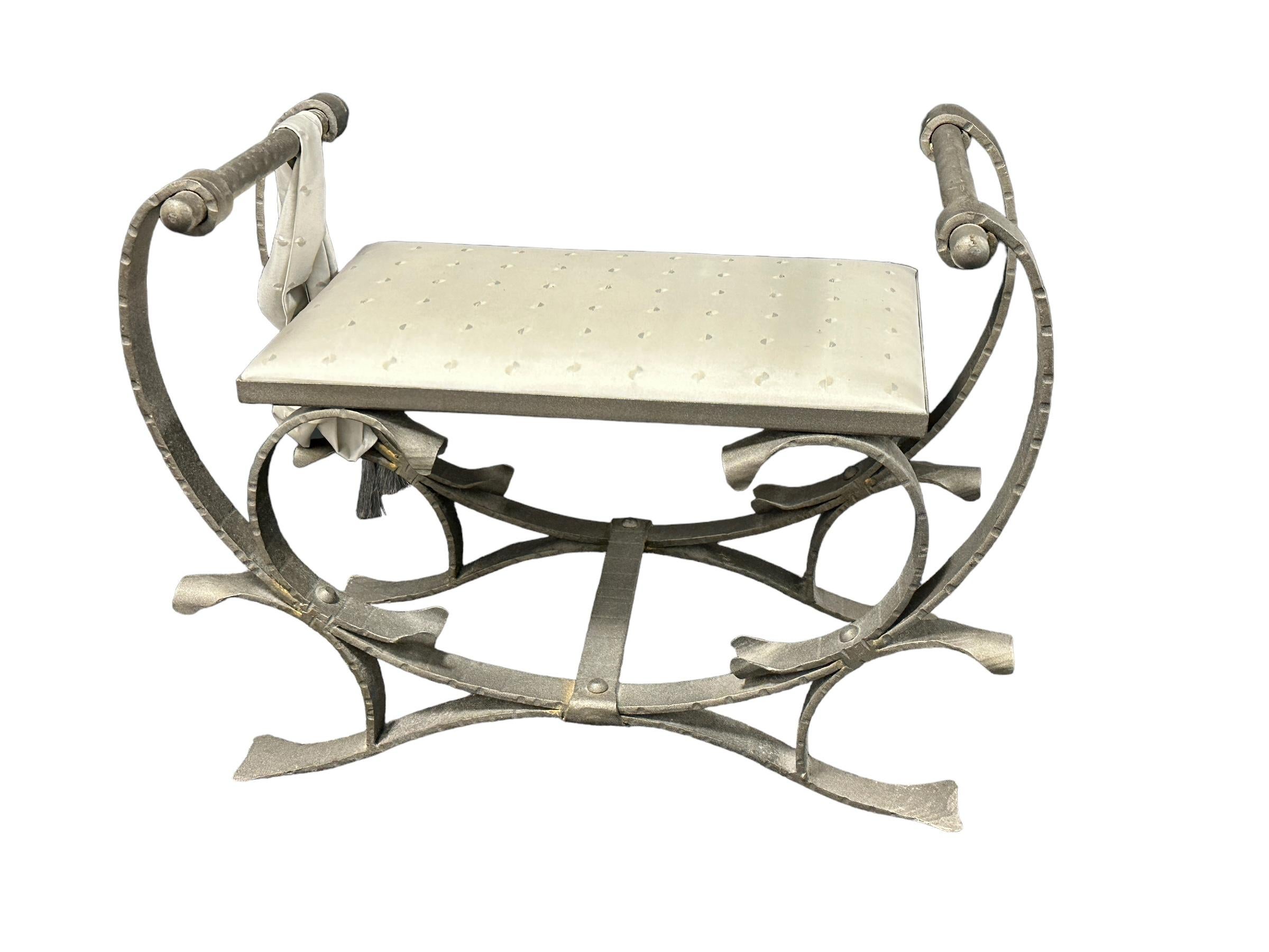 Classic 1960s heavy wrought iron stool bench. Nice addition to your room, entry hall or vanity room. Made of metal and a satin covered plate. Found at an estate sale in Nuremberg, Germany.