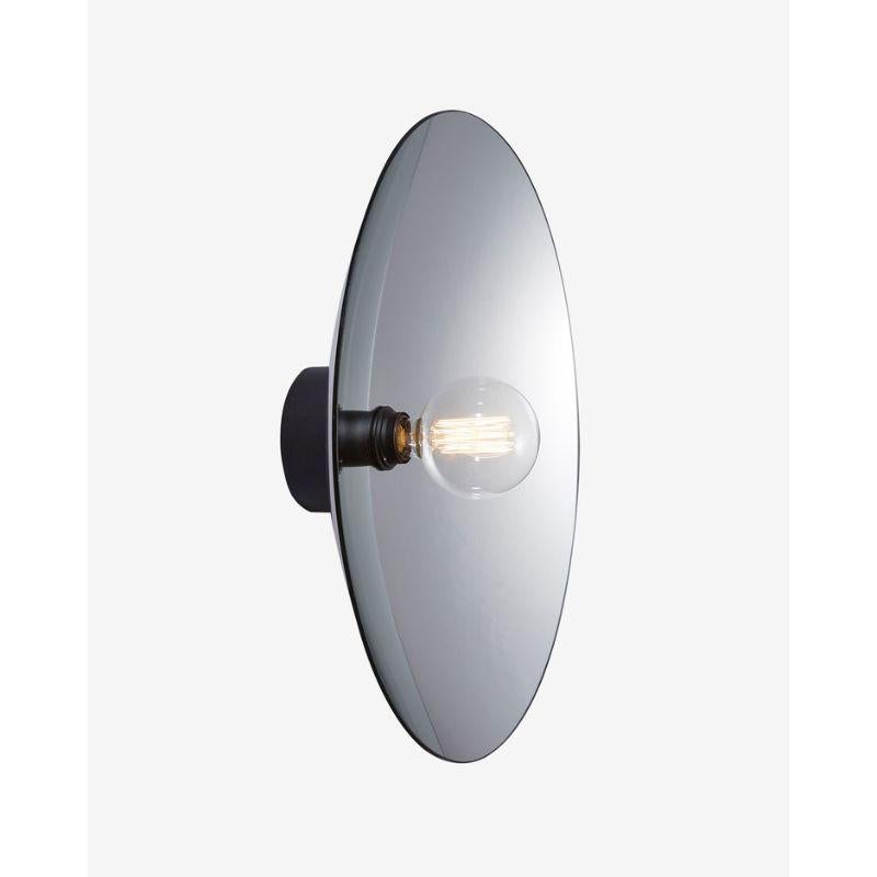 Silver Zénith wall light, large by RADAR
Materials: Silver thermoformed glass, metal.
Dimensions: W 15 x D 70 cm

Also available: In gold and matt black metal structure or solid oak

All our lamps can be wired according to each country. If