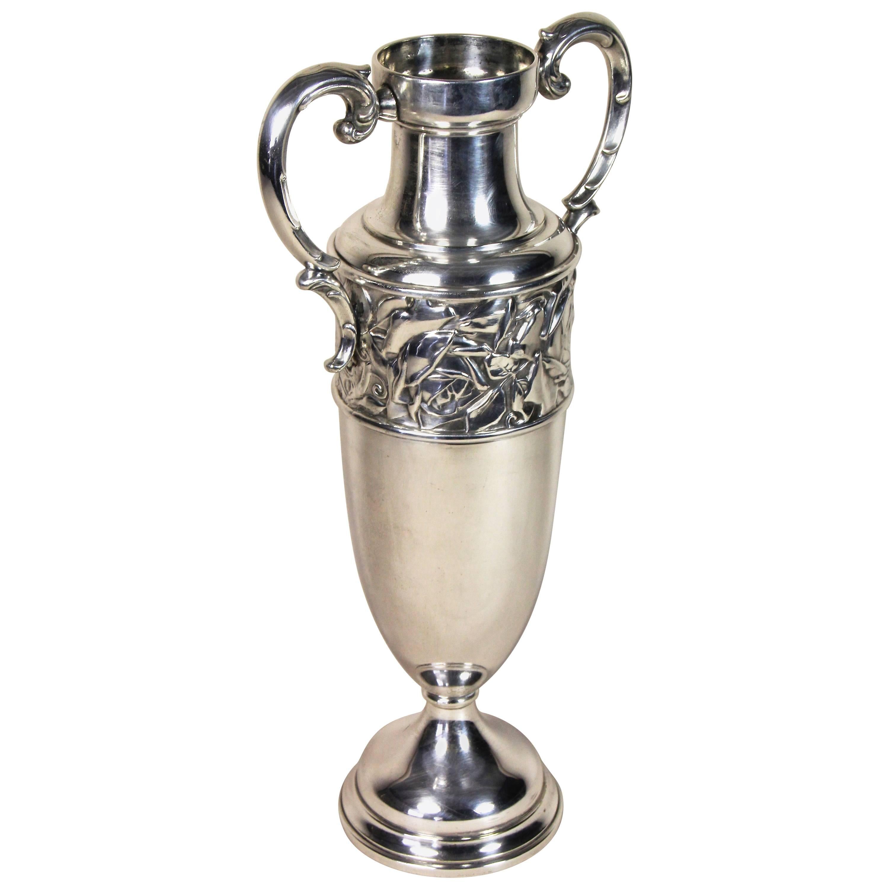 Spectacular silvered amphora vase from the renown Art Nouveau period in Slovakia around 1915. Artfully made of fine silvered brass it shows a fantastic shape adorned by lovely worked rose blooms and foliage. Another highlight are the beautifully