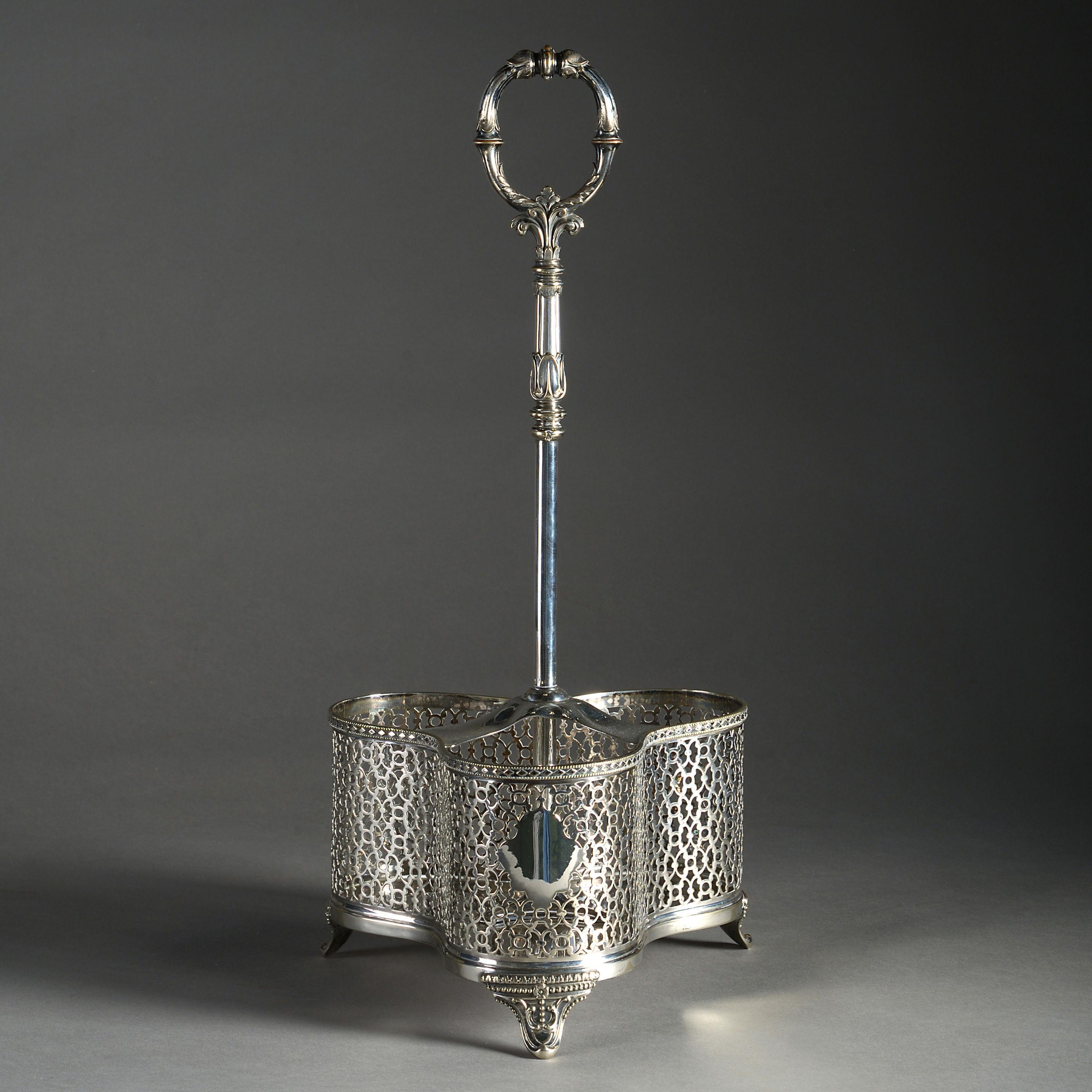 A set of Three nineteenth century coloured glass cordial Bottles Retaining their original; stoppers, together with a pierced silver plated holder with carrying handle. Having marks to the underside.