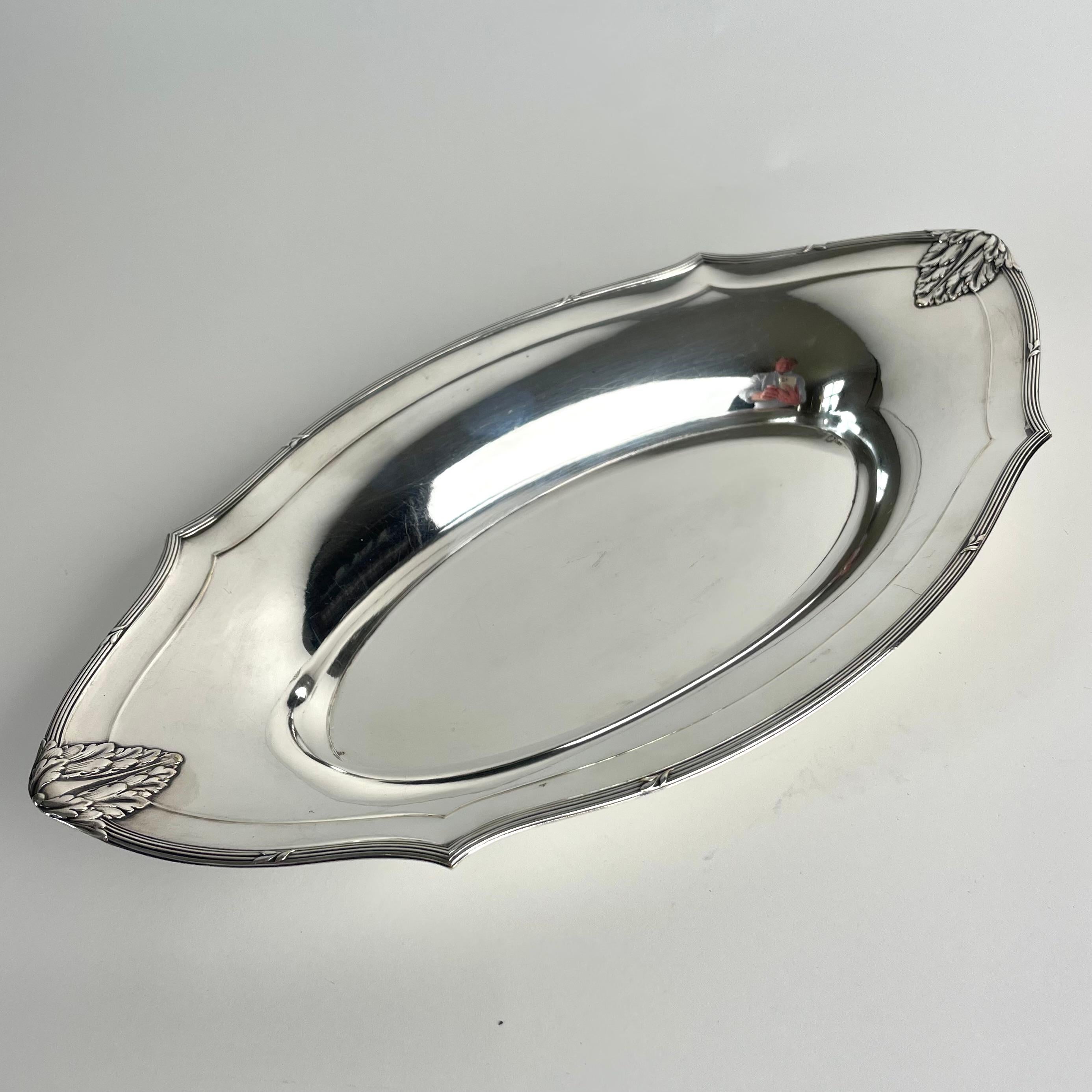 

Silvered Brass Bowl by WMF, Germany, 1910s

A refined and decorative silvered brass bowl produced by the renowned German manufacturer WMF (Württembergische Metallwarenfabrik) in the 1910s. This elegant piece combines the graceful fluidity of late