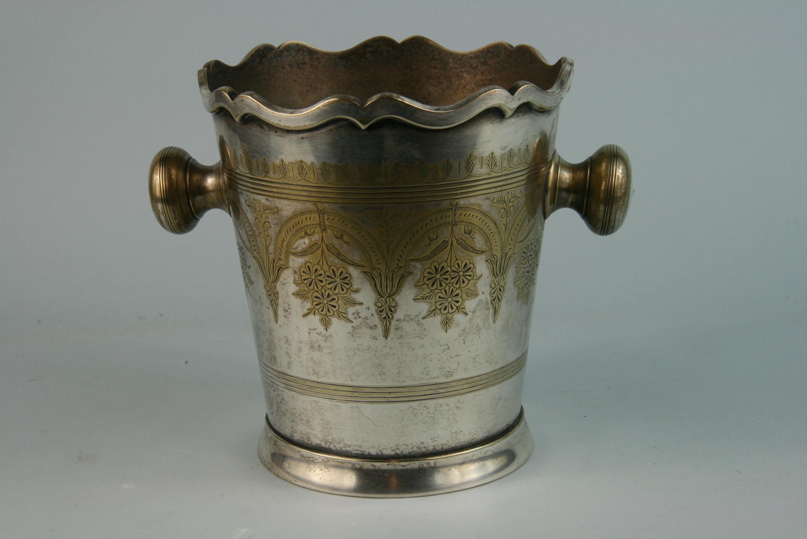 3-537 Silvered brass wine cooler/ice bucket with repousse detailing and ball handles
Marked Leonard on Bottom with makers marks.