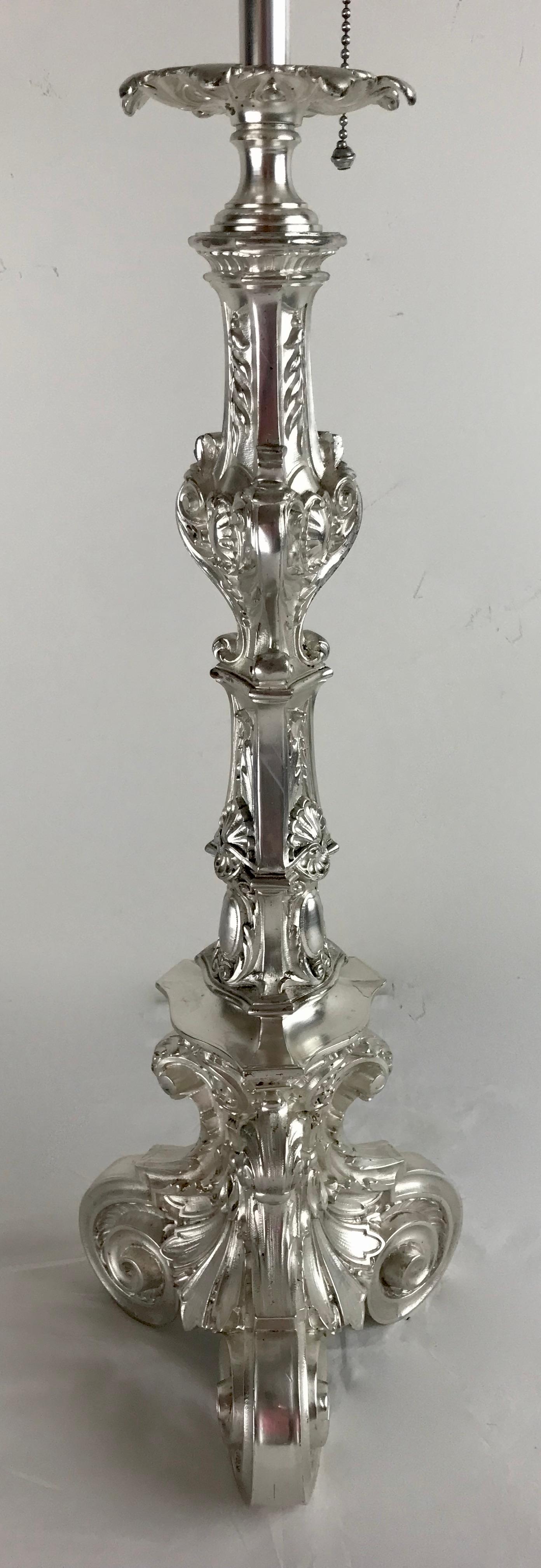 Attributed to E. F. Caldwell, this quality cast bronze lamp base is finely detailed and retains its original finial.