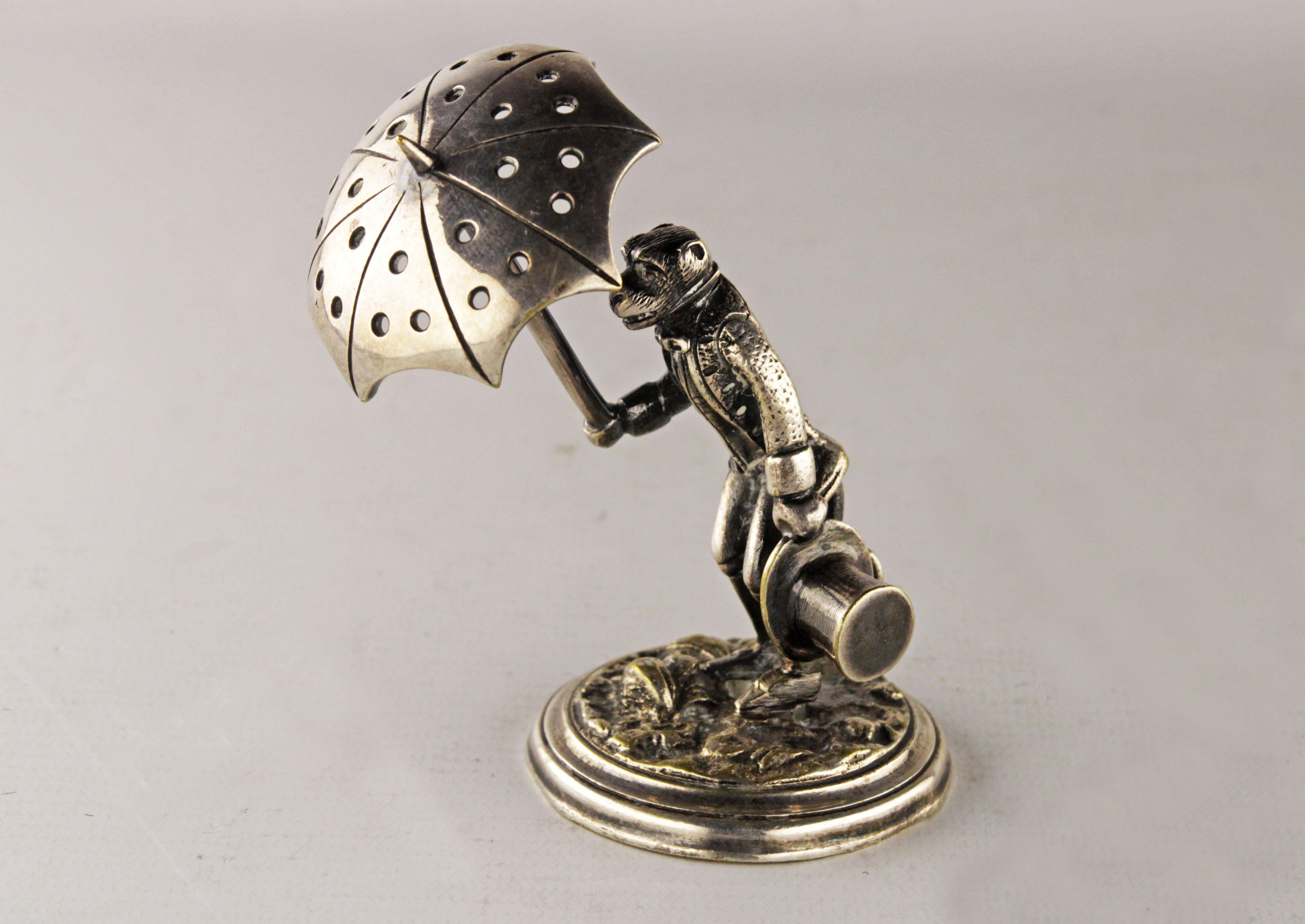 Silvered bronze toothpick holder of dressed monkey with umbrella and top-hat

By: unknown
Material: bronze, silver, metal, copper
Technique: cast, patinated, silvered, molded, polished, metalwork
Dimensions: 3.5 in x 2.5 in x 4 in
Date: late 19th