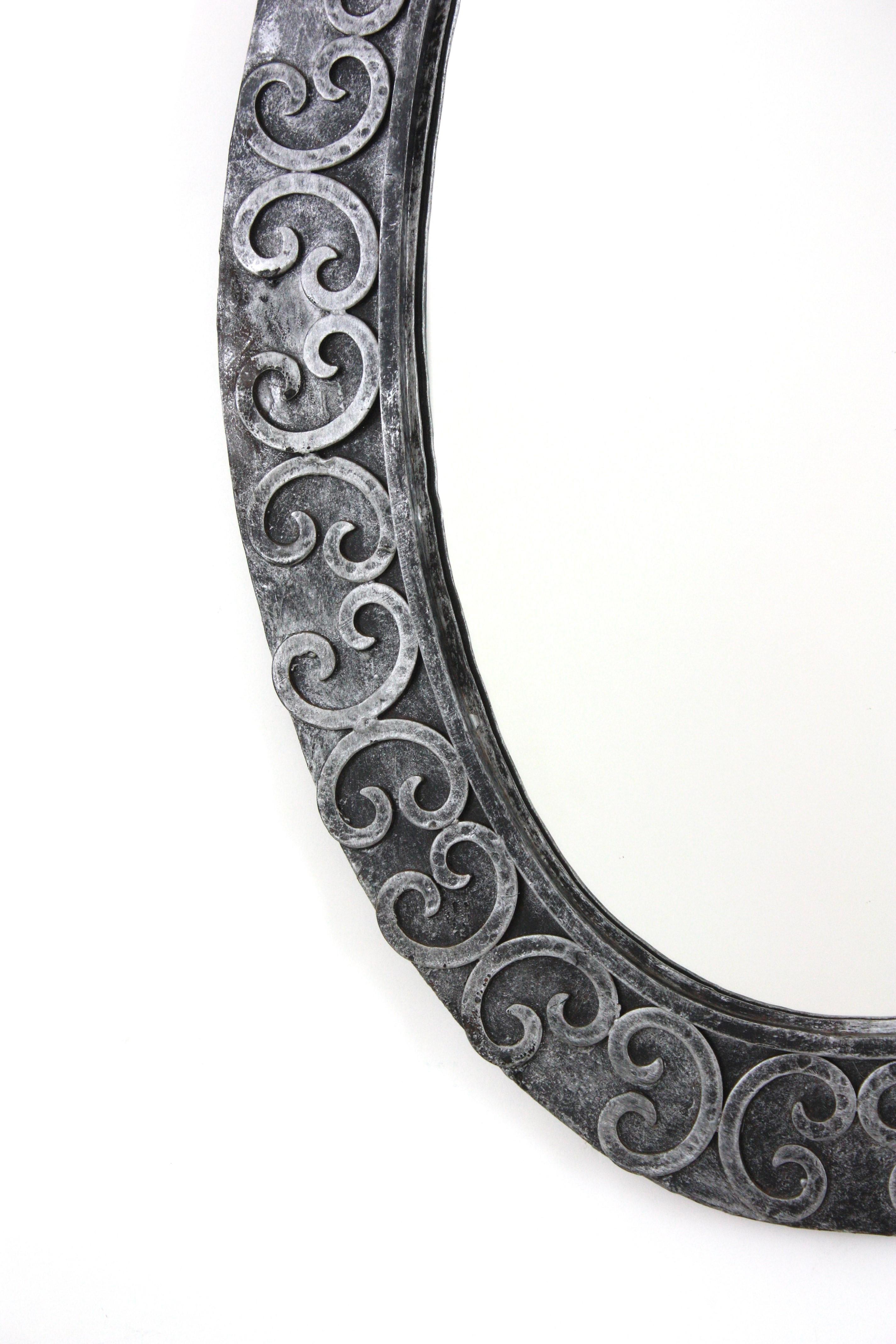 Silvered Brutalist Oval Mirror in Wrought Iron with Scroll Decorations For Sale 2