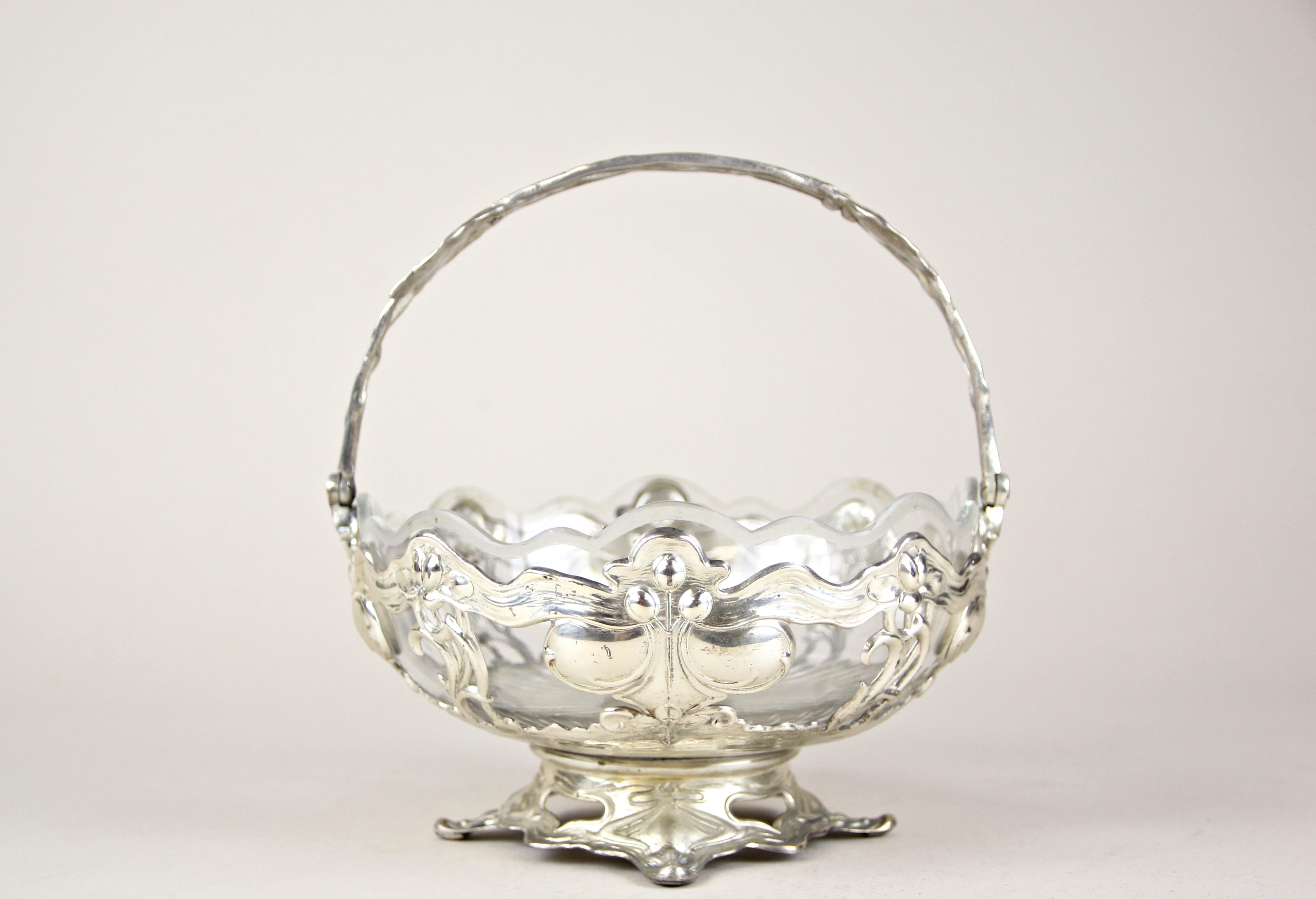 Very adorable silvered centerpiece with cut glass bowl by A. Köhler & Cie (WMF) out of the secession period in Vienna, circa 1905. An absolute amazing designed centerpiece showing typical lines of this famous era. Nestled in the beautiful open