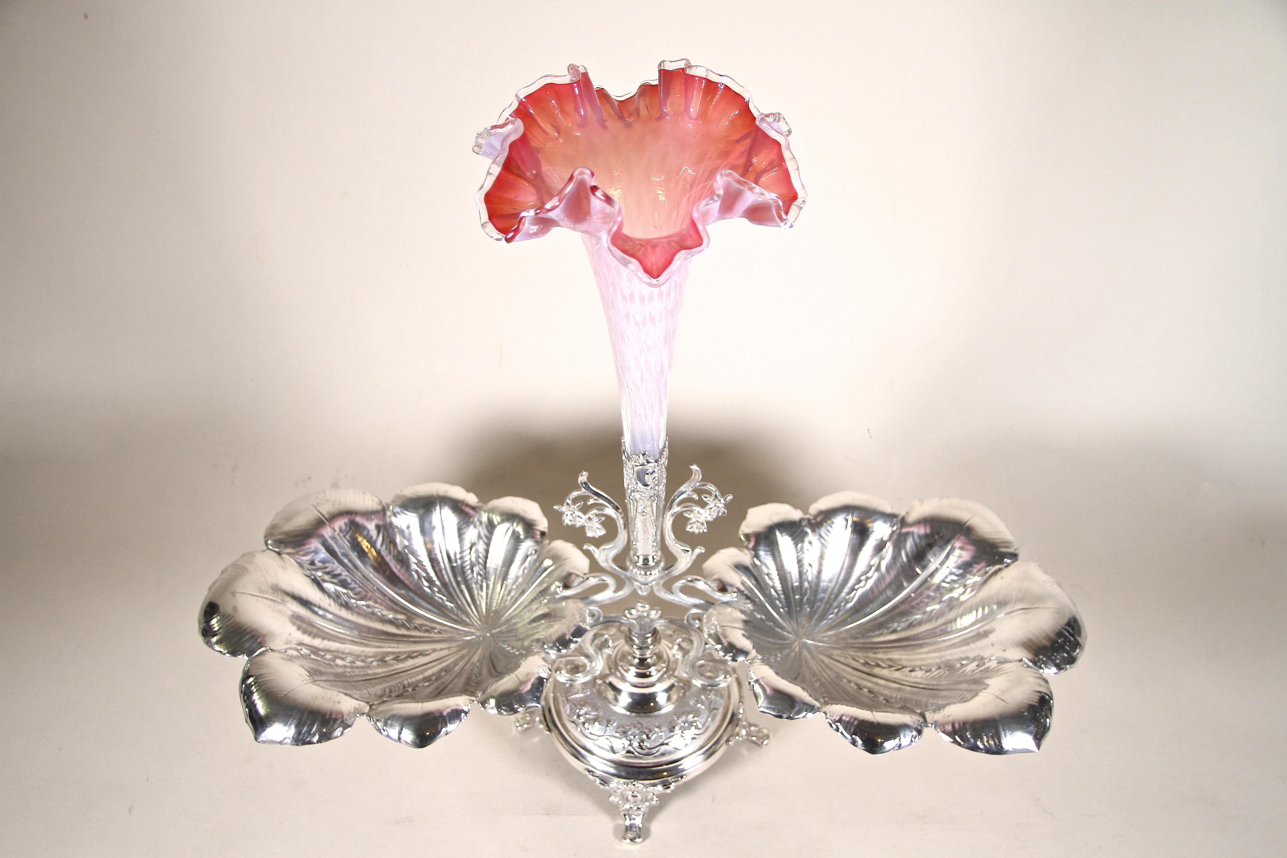 Outstanding silvered centerpiece from the Art Nouveau period in Austria around 1900. Standing on a beautifully shaped base, this exceptional centerpiece impresses with an absolutely gorgeous design. Two large artfully processed leaf-like silvered