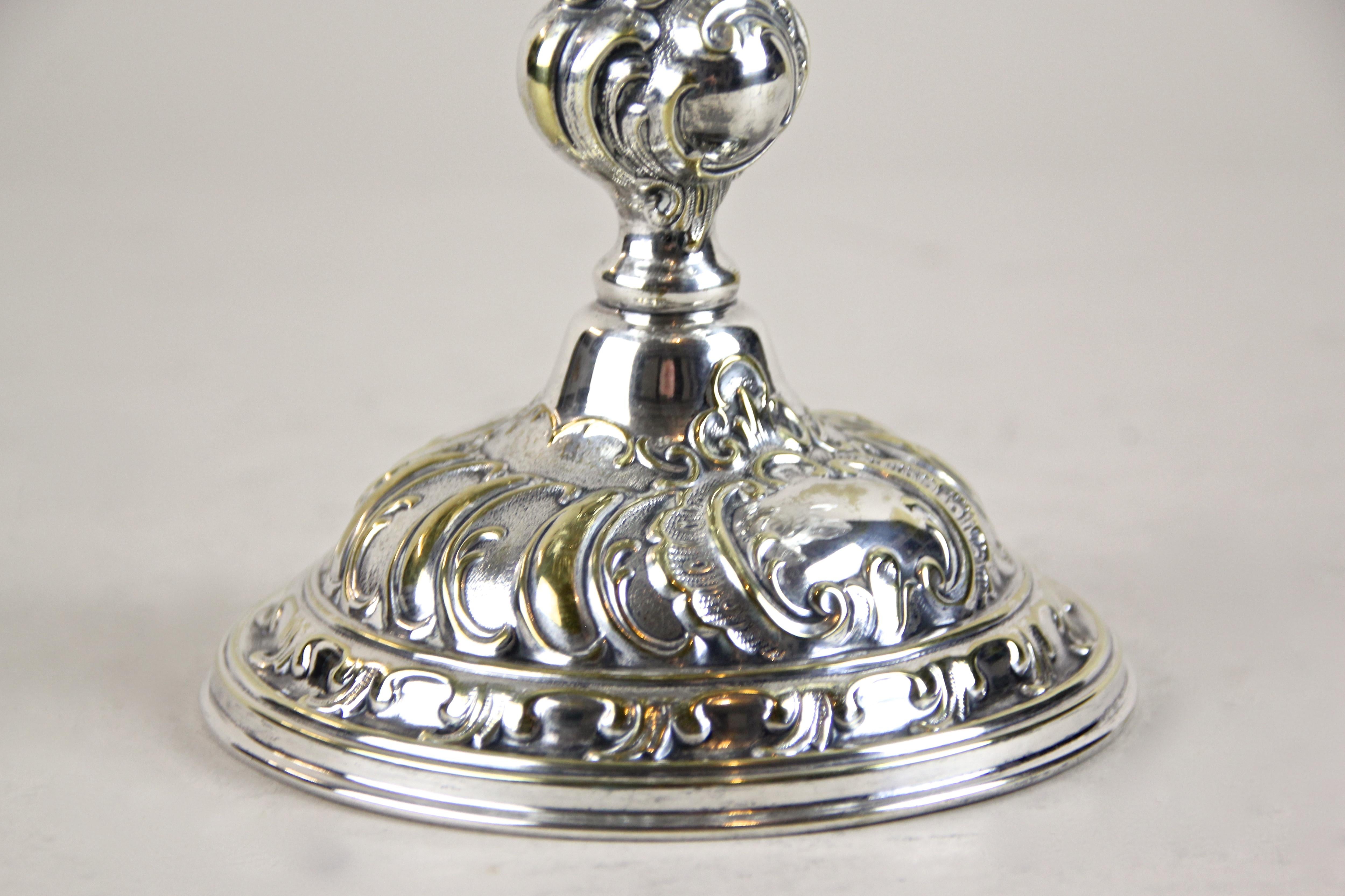 Lovely silvered Art Nouveau centerpiece with ruffled glass bowl from Austria, circa 1900. The gorgeous mouth blown glass bowl sits on a silver plated artfully made brass stand by showing some minimal abrasion. The unique shaped glass bowl impresses