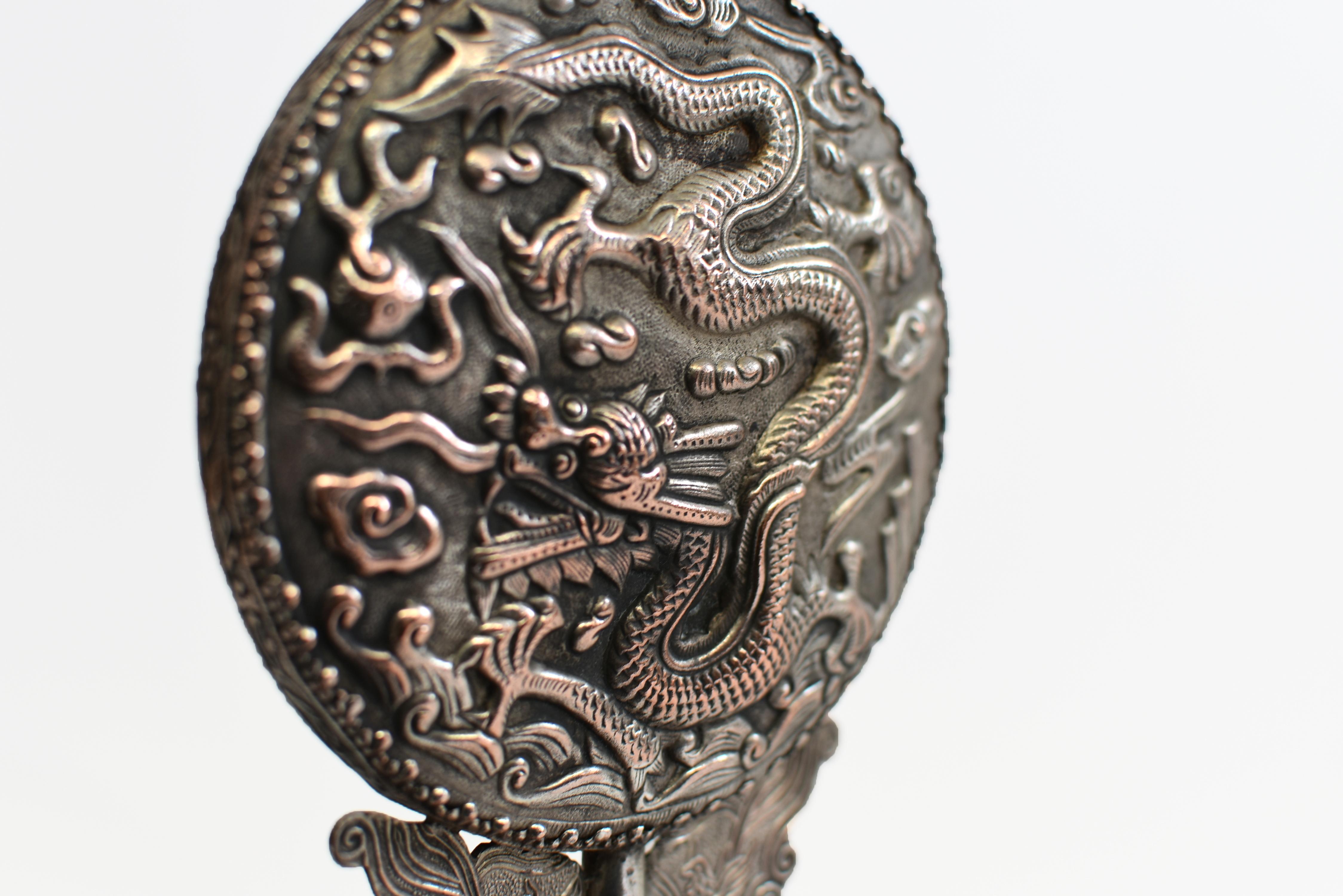 Metal Silvered Hand Held Mirror with Serpentine Handle