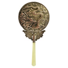 Silvered Hand Held Mirror with Serpentine Handle