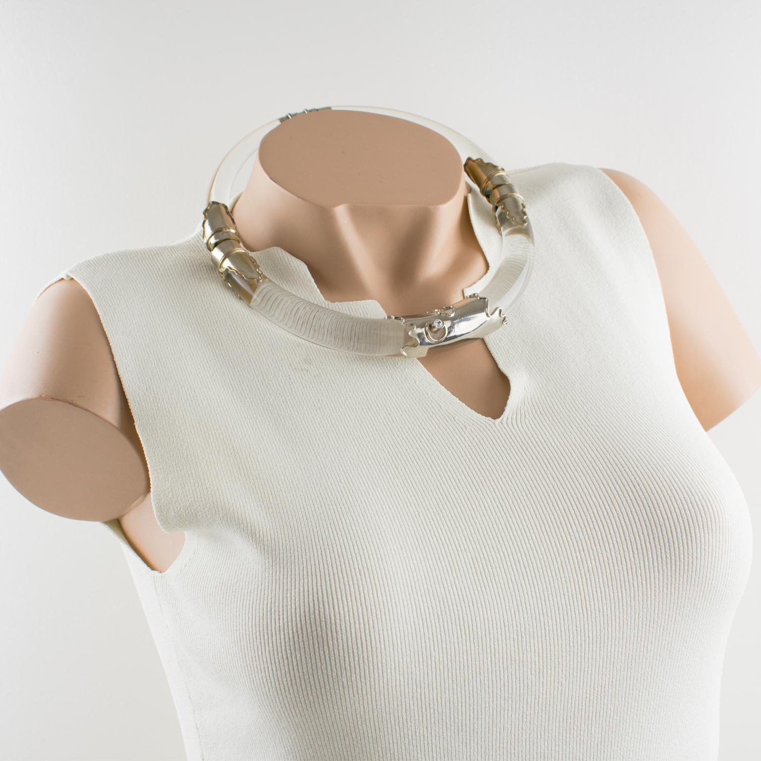 Gorgeous sculptural Lucite choker necklace by an artisan designer studio in Italy. Massive rigid collar necklace fully articulated. Futuristic silvered metal embellishments wrap around the clear Lucite band and are ornate with one crystal clear
