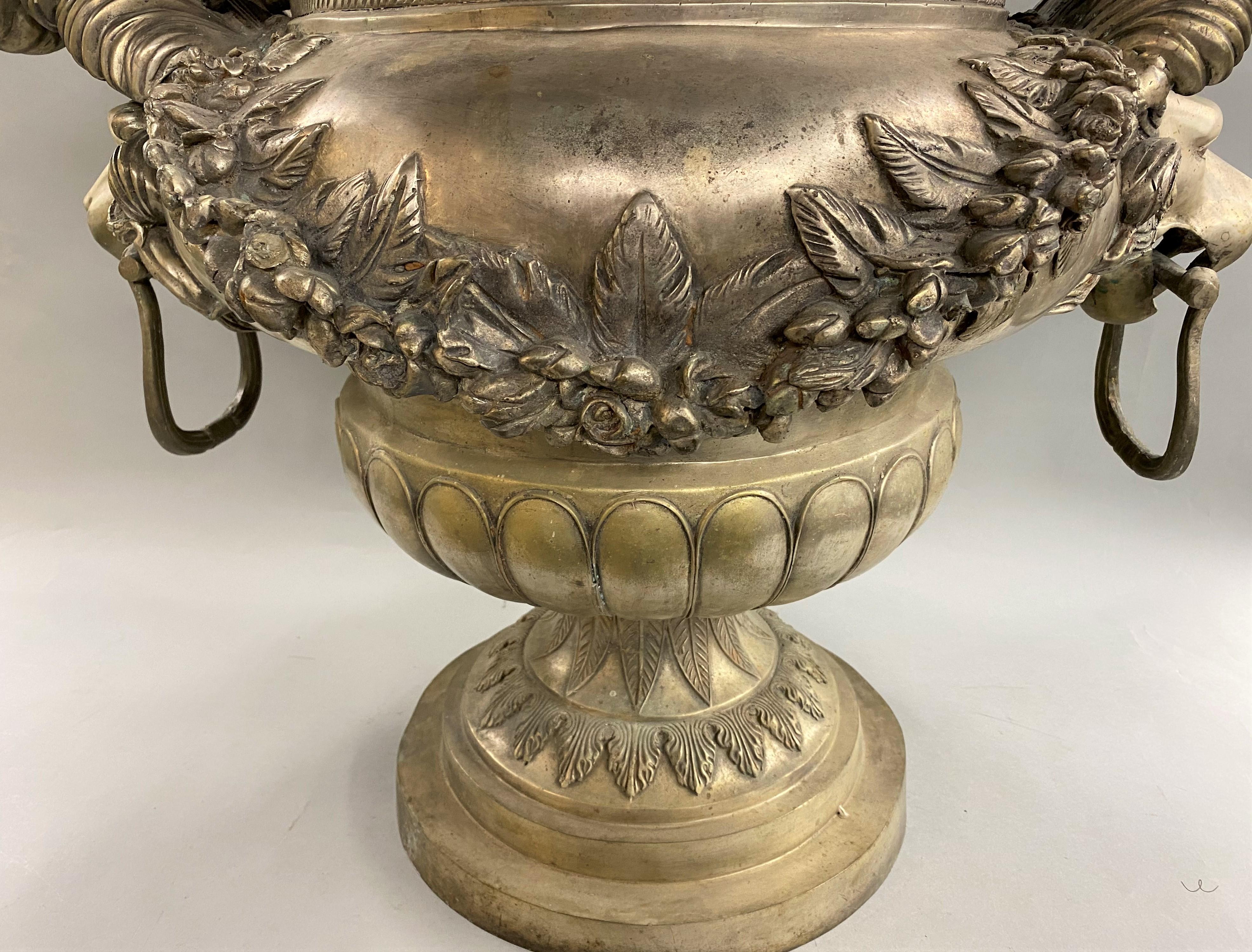 Silvered Metal Handled Garden Urn with Lion Heads and Winged Putti In Good Condition In Milford, NH