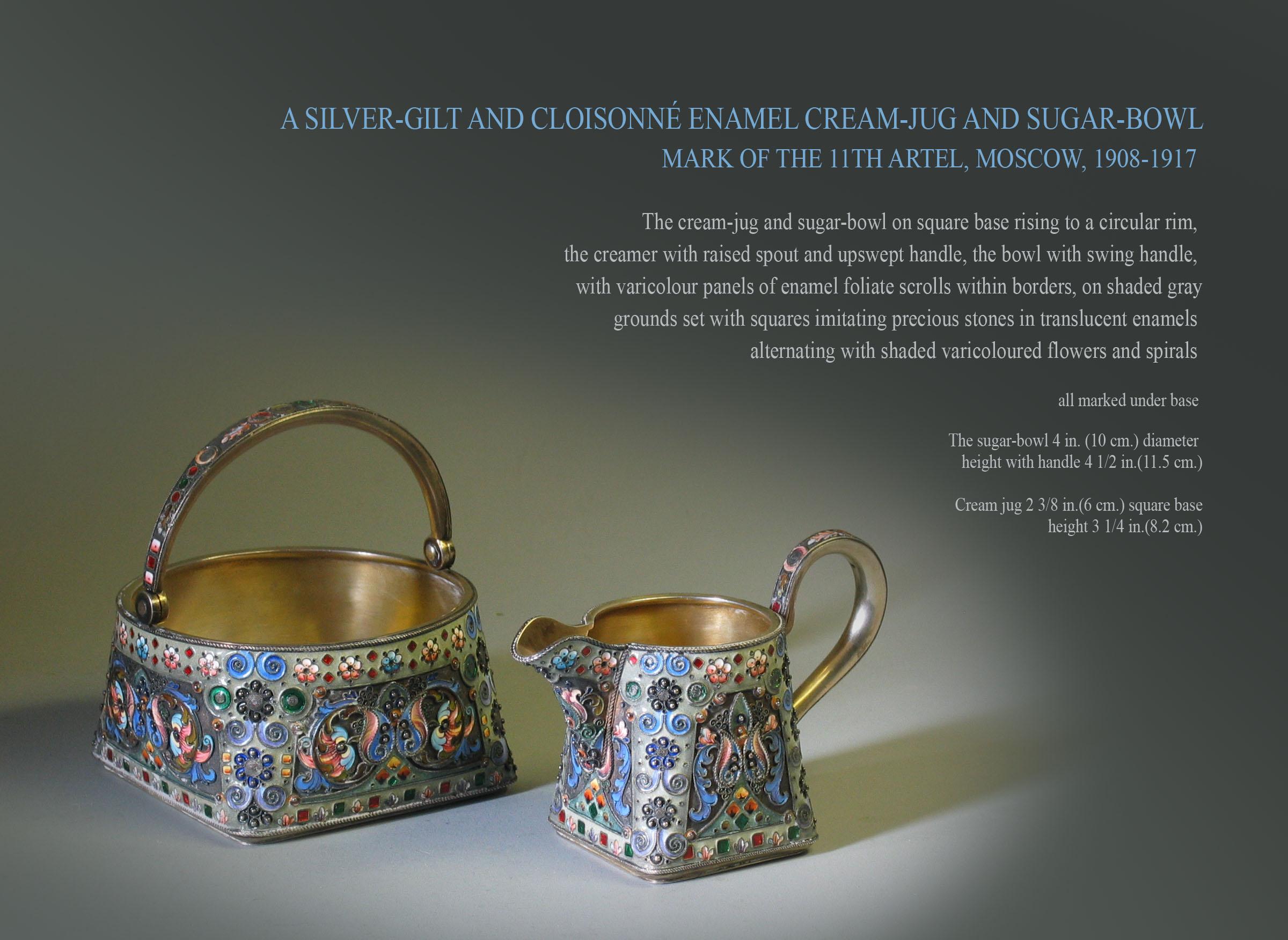 A Silver-gilt and Cloisonné Enamel Cream-jug and Sugar-bowl
Mark Of The 11th Artel, Moscow, 1908-1917

The cream-jug and sugar-bowl on square base rising to a circular rim, 
the creamer with raised spout and upswept handle, the bowl with swing