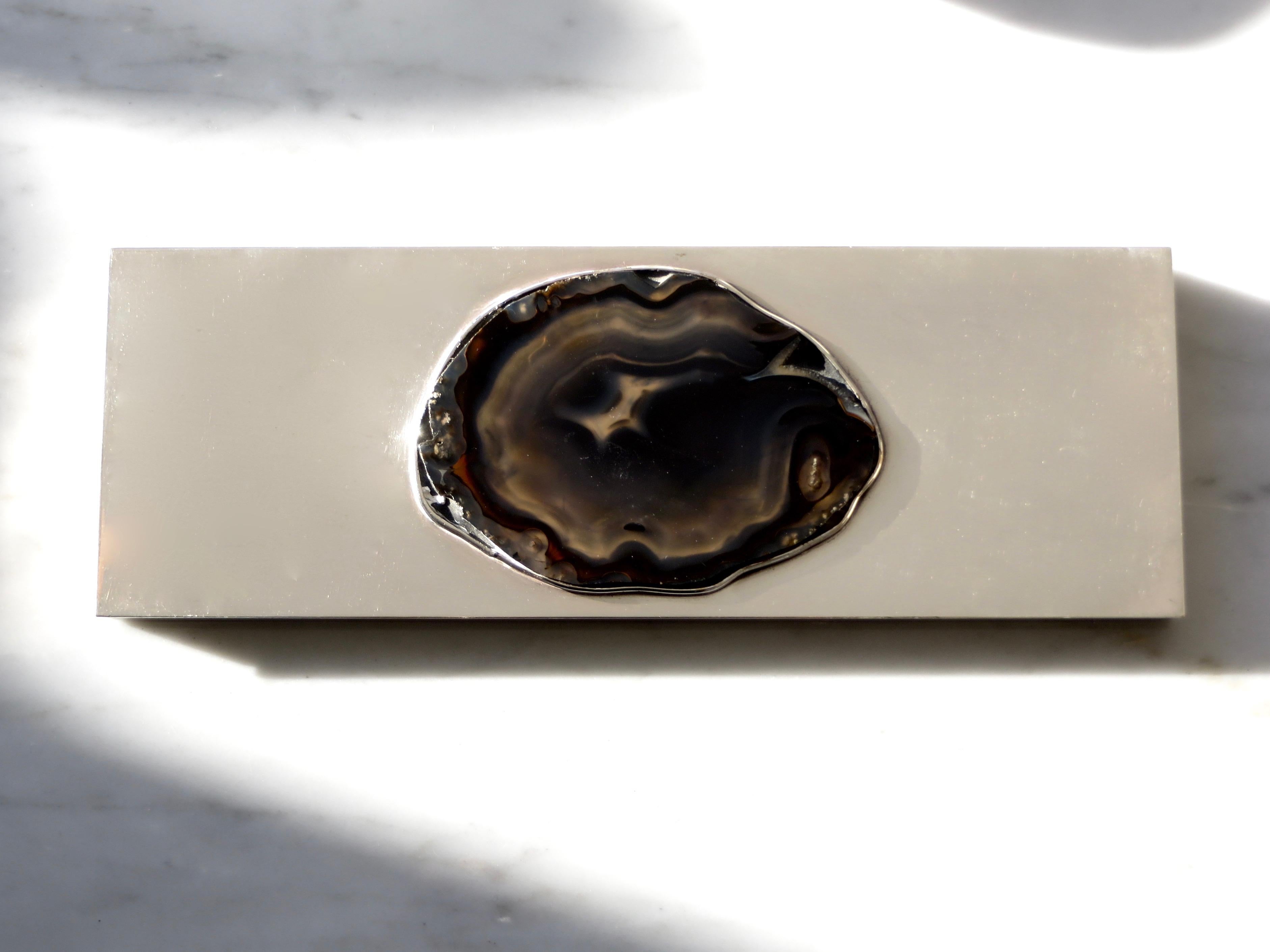 Elegant modernist 1970s silver plate and agate decorative box reminiscent French designer Maria Pergay work. 
Streamline rectangular shape with large agate in the center. No visible maker's mark.
Lined with black leather. 
A scratch mark on the