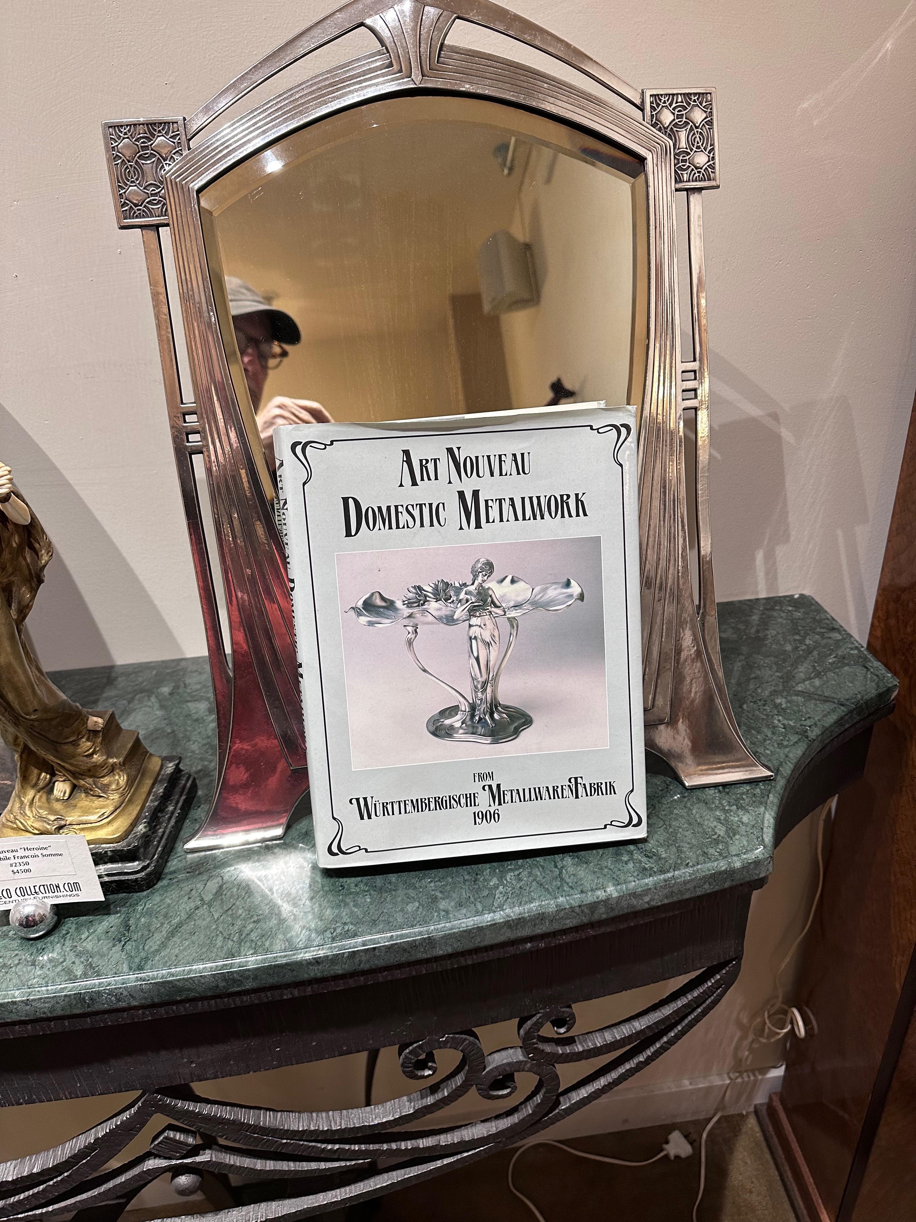 This Silverplate Art Deco/Art Nouveau WMF Table Mirror is ideal for a dressing table, vanity, or mantle. It features stylish details that transition from Art Nouveau to Art Deco, with elements that could even be considered Secessionist design. The