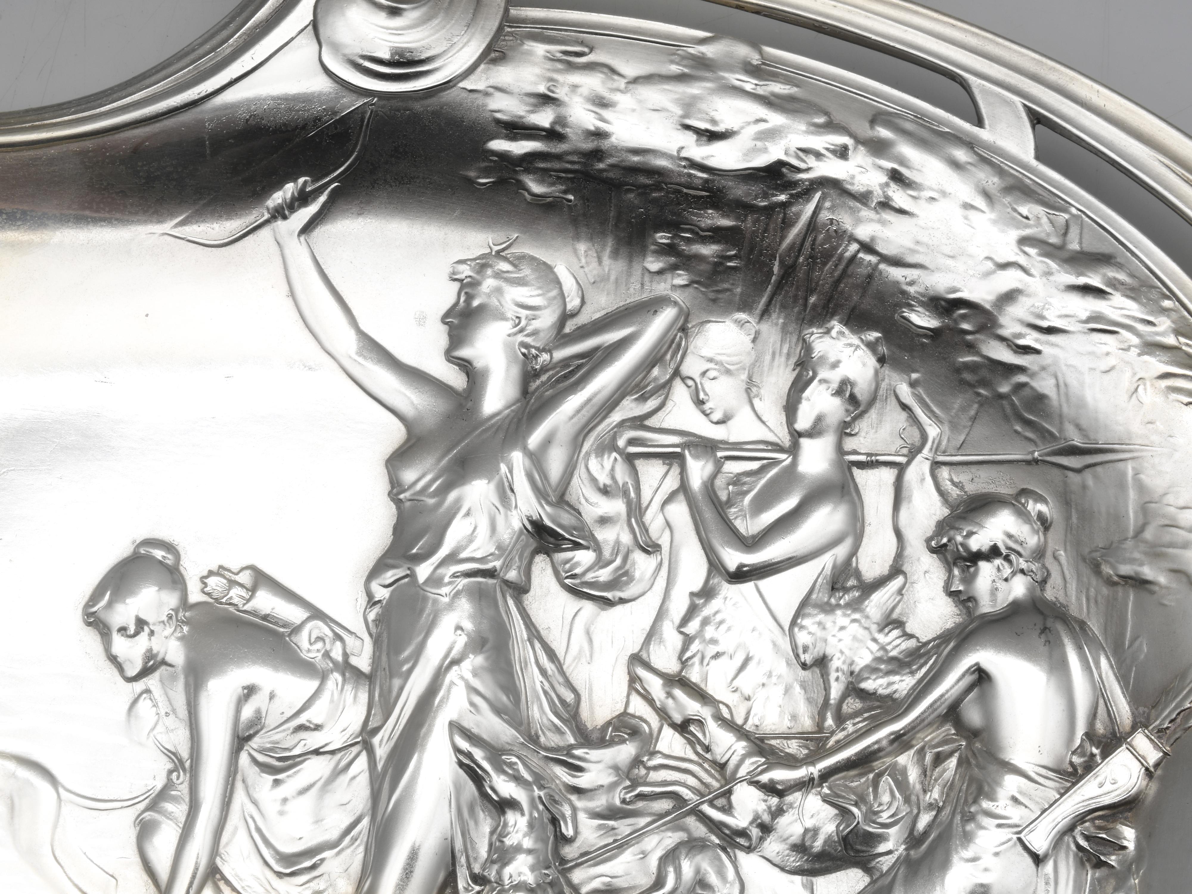 This tray by WMF dates to approximately 1900–1910. This type of tray was highly fashionable in the Belle Époque era and was exported widely throughout Europe and to Latin America (often marked “ALEMANIA”). The design has undulating lines and flowing