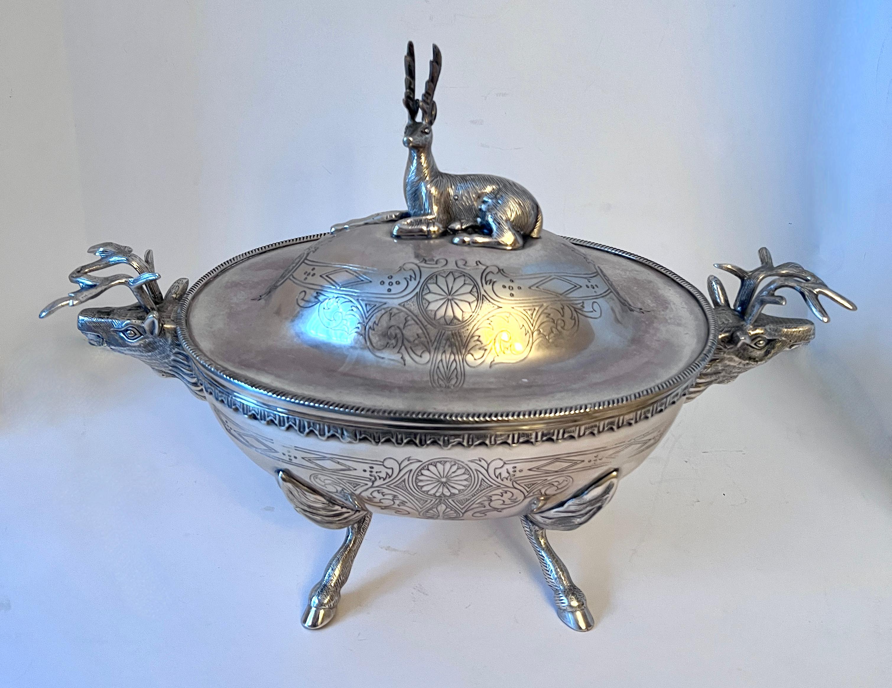 A Beautiful designed silver plate lidded Tureen.  The Stag theme is carried throughout, in the handles, lid and also the unique use of feet with hooves. 

A wonderful centerpiece which can also hold cooked foods or other thing such as fruits,