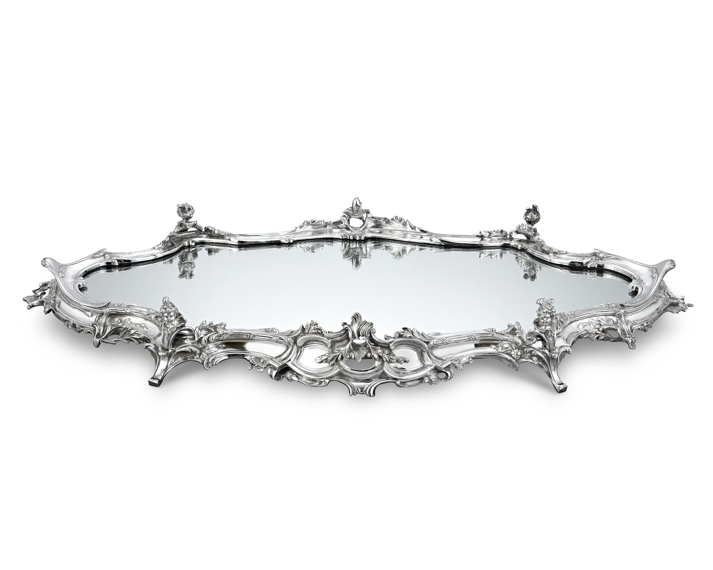 Silverplate Mirrored Centerpiece
Ercuis
20th Century

This extraordinary silverplated mirrored centerpiece showcases the refined artistry of Ercuis, one of France’s most celebrated silverware firms. Founded in 1867, the company is renowned for its