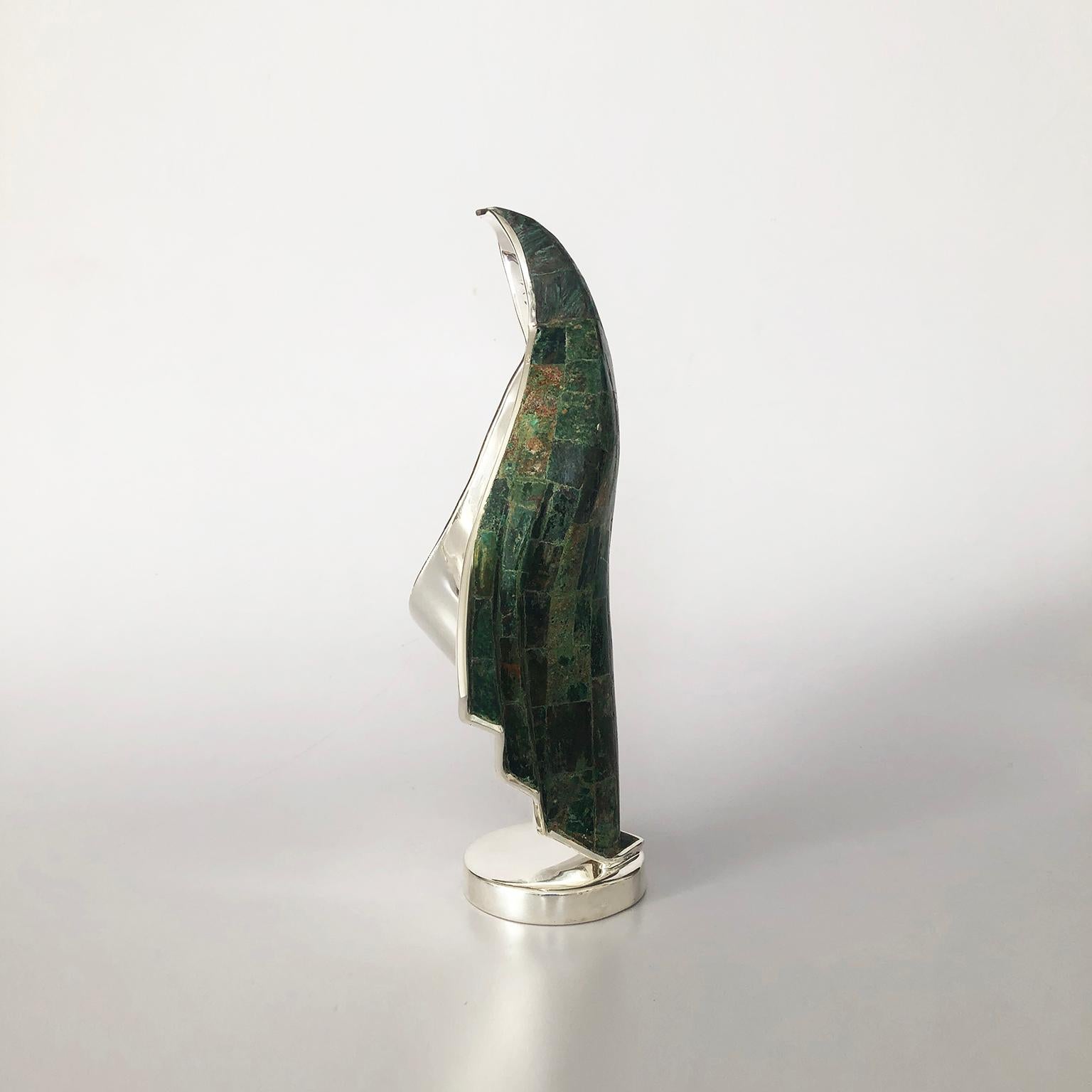 We offer this silver plate Virgin sculpture designed by Los Castillo, circa 1960. Of Taxco, Mexico. Handmade object with precious stone inlay, standing on a circular base, includes trademark of Los Castillo Taxco.