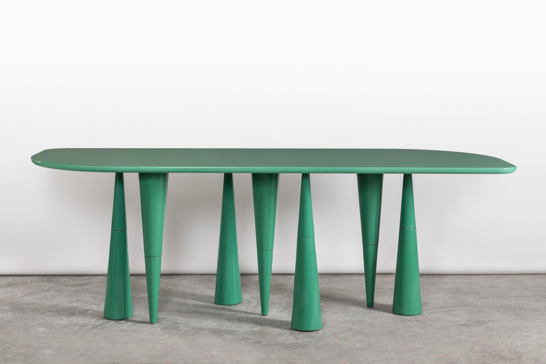 Silvette limited edition dining table by Moure Studio
Limited Edition of 8
Dimensions: D 80 x W 40 x H 80 cm
Materials: Enameled lava stone
Also available in different colours.

Dining table made of enameled lavastone. Silvette translates its