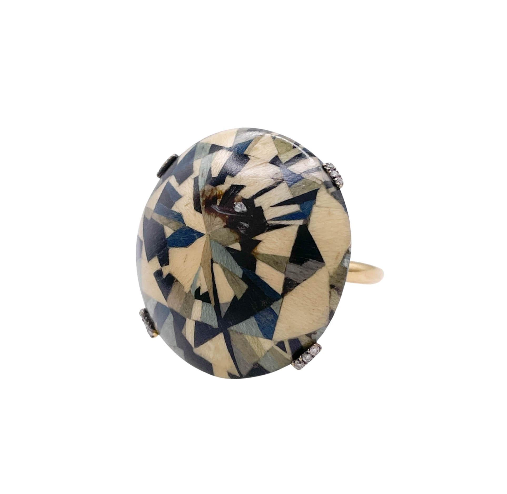 Silvia Furmanovich 18k Yellow Gold Diamond and Marquetry Wood Ring with 0.05 Round Brilliant Diamonds.
Marquetry wood measures to approx. 26mm in diameter.
Sits high, approx. 11mm from the top of the finger.
The ring size is 7.75 (contact for