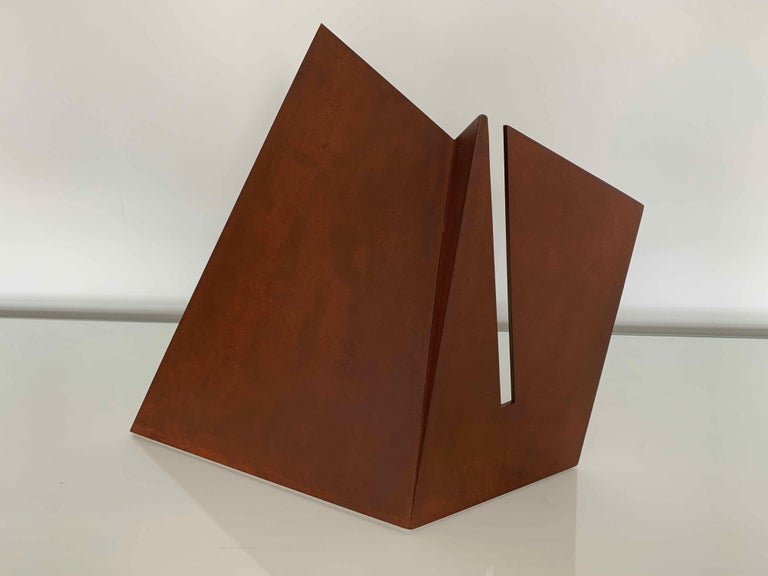 Fold with Fissure, 2012, Cast Iron, 12.6 x 14.9 x 6.2 in, 32 x 38 x 16 cm. Ed. 3 by Silvia Lerin

This work stems from Silvia’s interest in the relationships between shapes, volumes, colours and textures and their resulting presence. She tends to