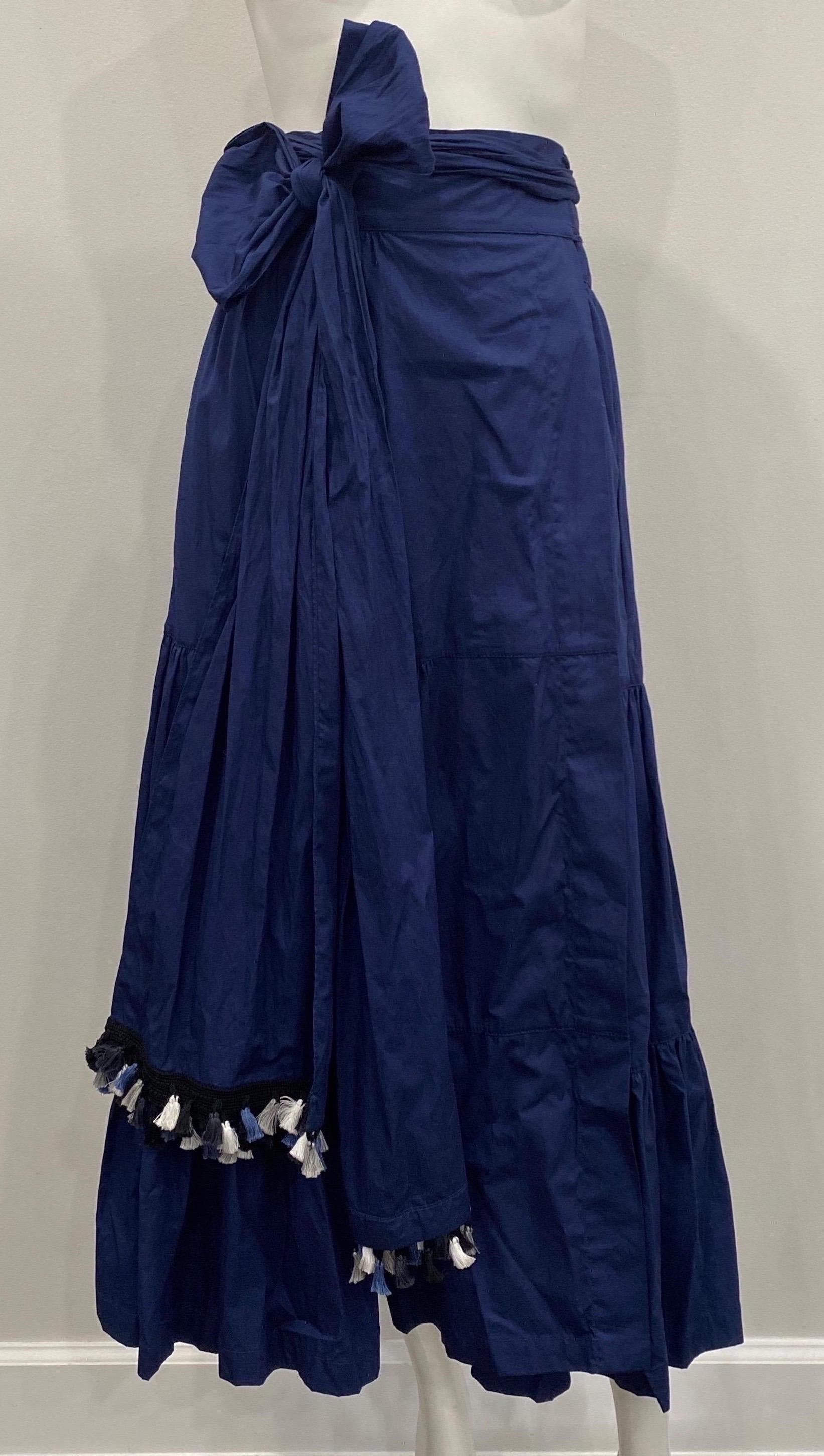 Silvia Tcherassi Michaela Navy Wrap Skirt -Size Medium This skirt is in excellent condition. This lovely skirt has a gently voluminous silhouette, is crafted from pure cotton. I has broad ties that are accented with contrast tassels add extra